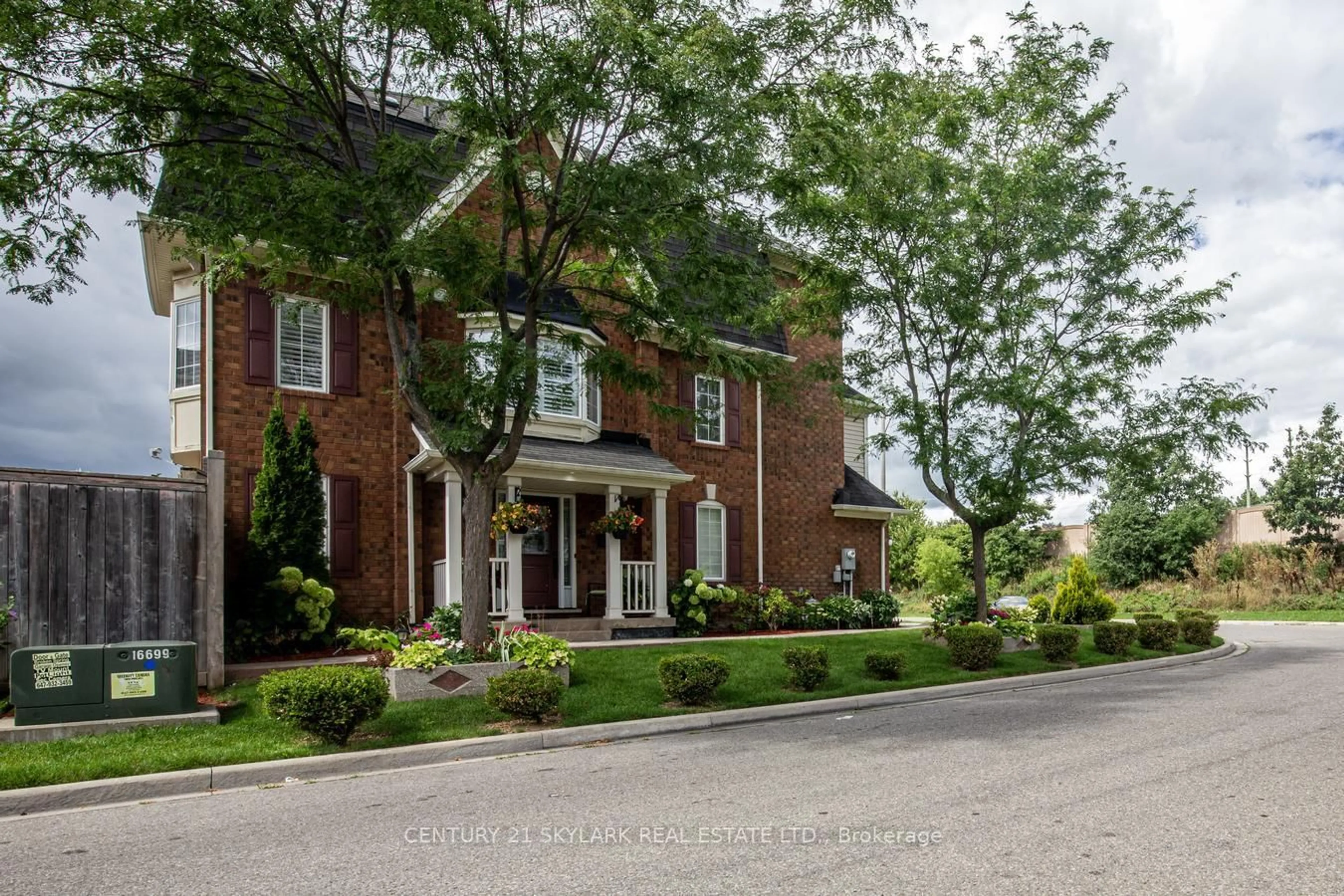 Home with brick exterior material, street for 21 Decker Hollow Circ, Brampton Ontario L6X 0K9