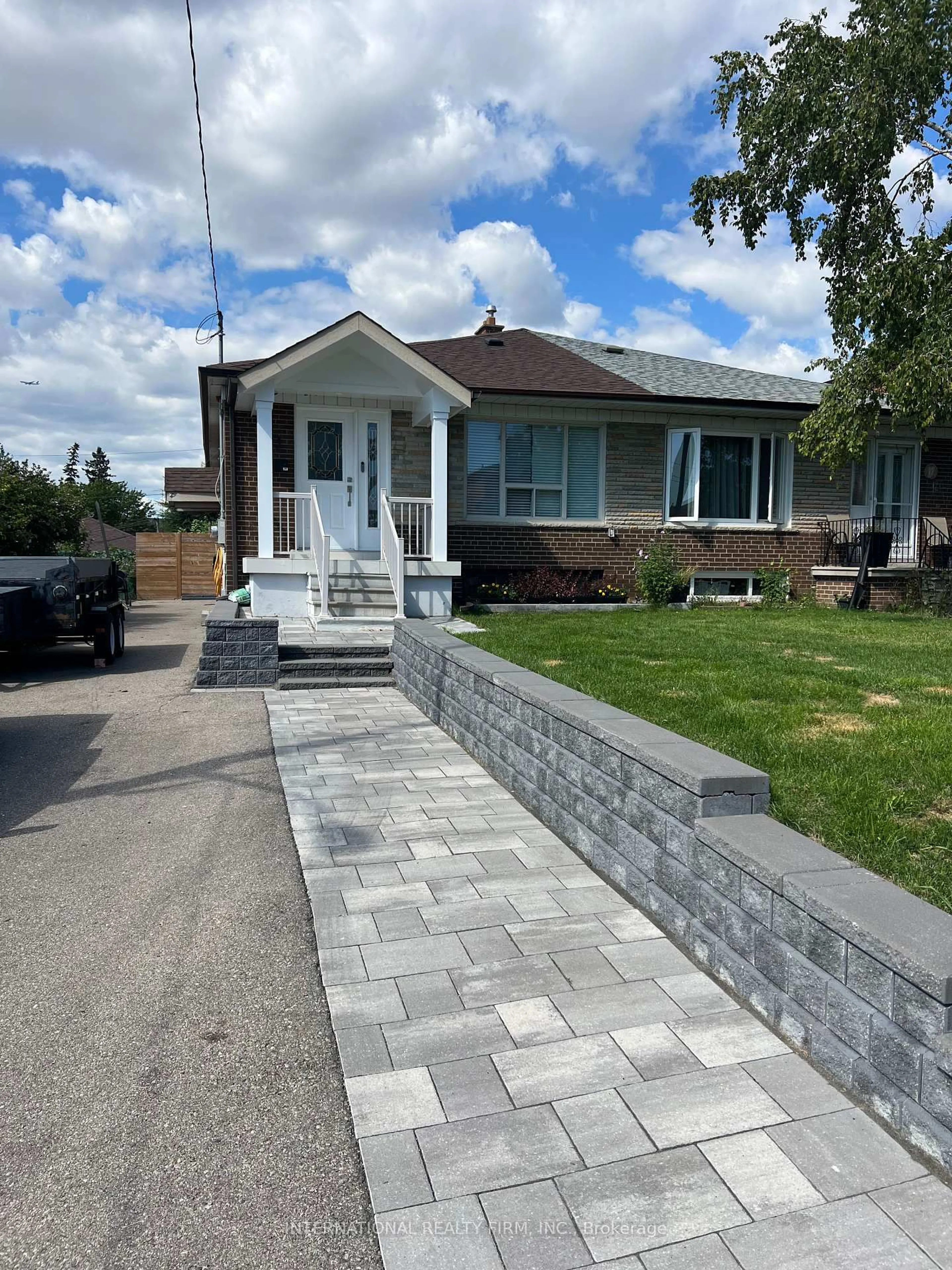 Home with brick exterior material, street for 10 Rambler Pl, Toronto Ontario M3L 1N7
