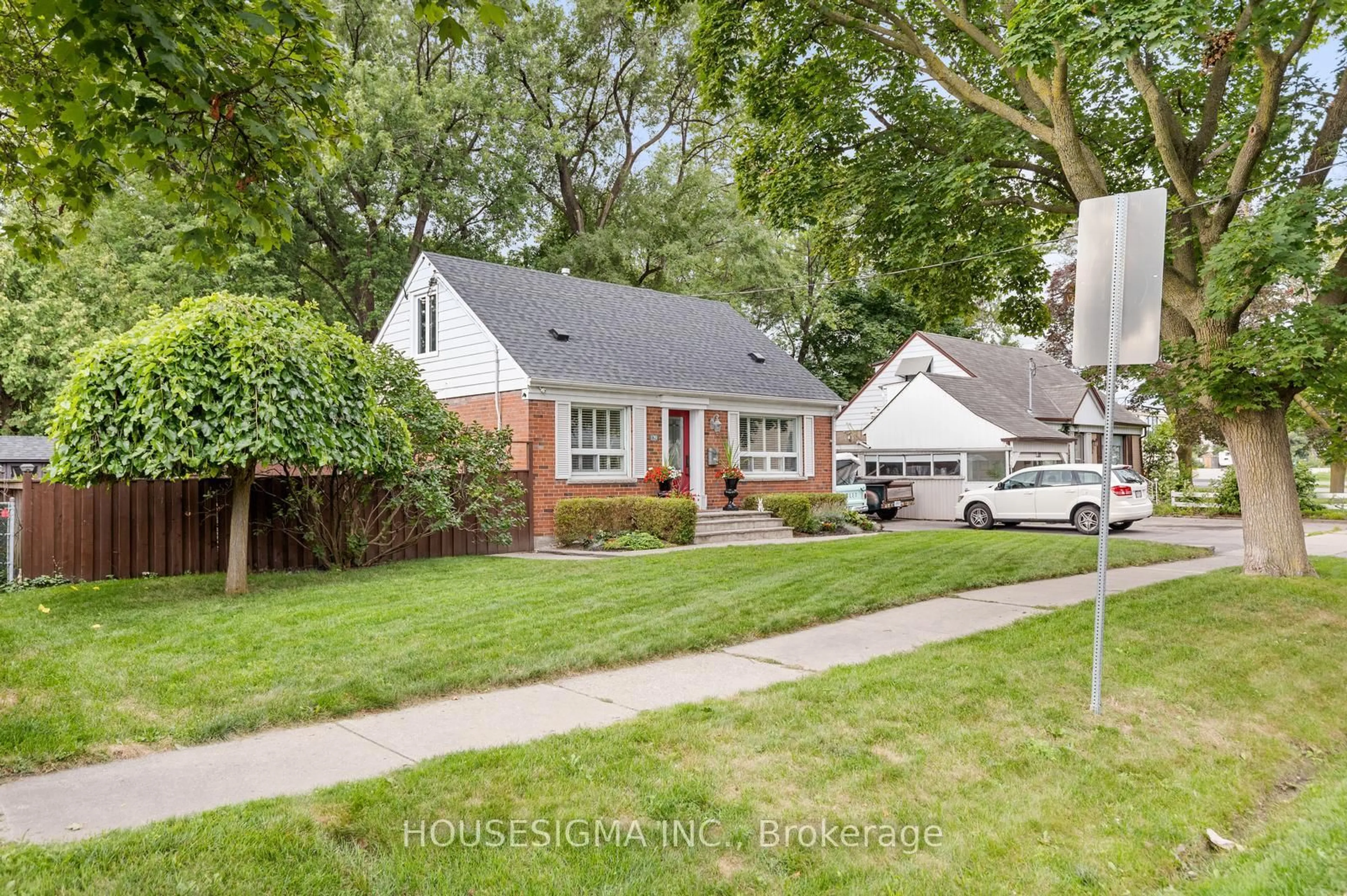 Home with vinyl exterior material, street for 129 Edgecroft Rd, Toronto Ontario M8Z 2C2