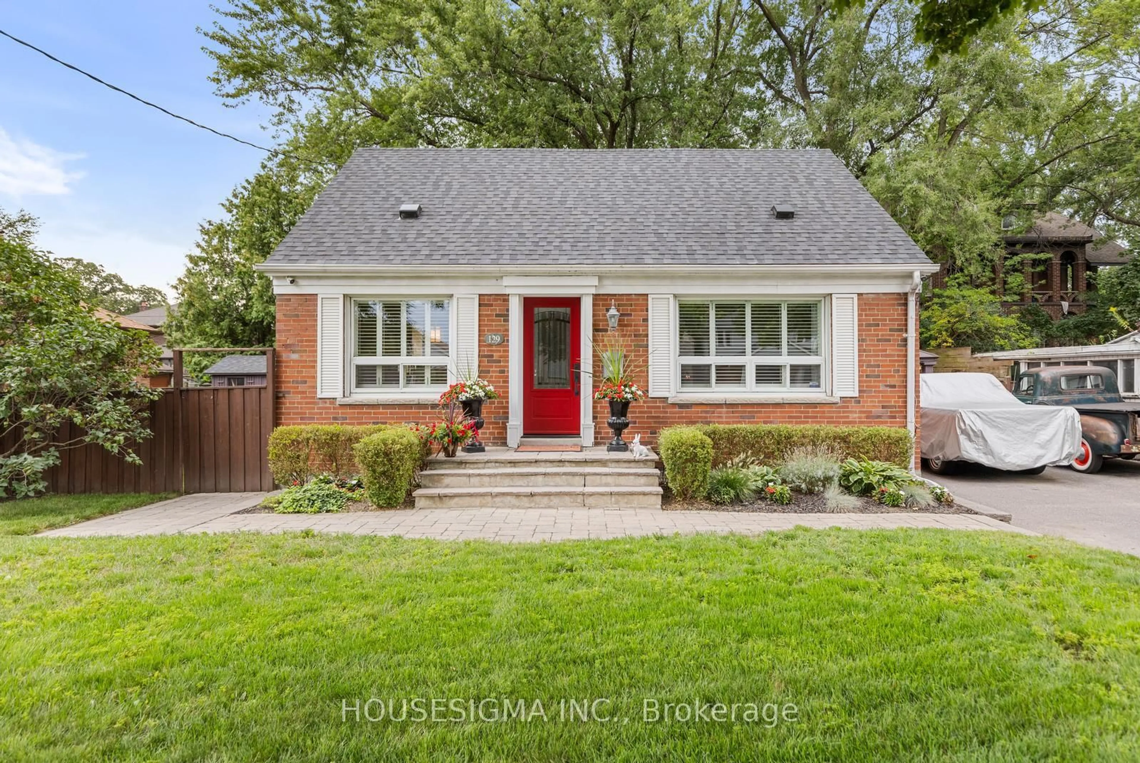 Home with brick exterior material, street for 129 Edgecroft Rd, Toronto Ontario M8Z 2C2