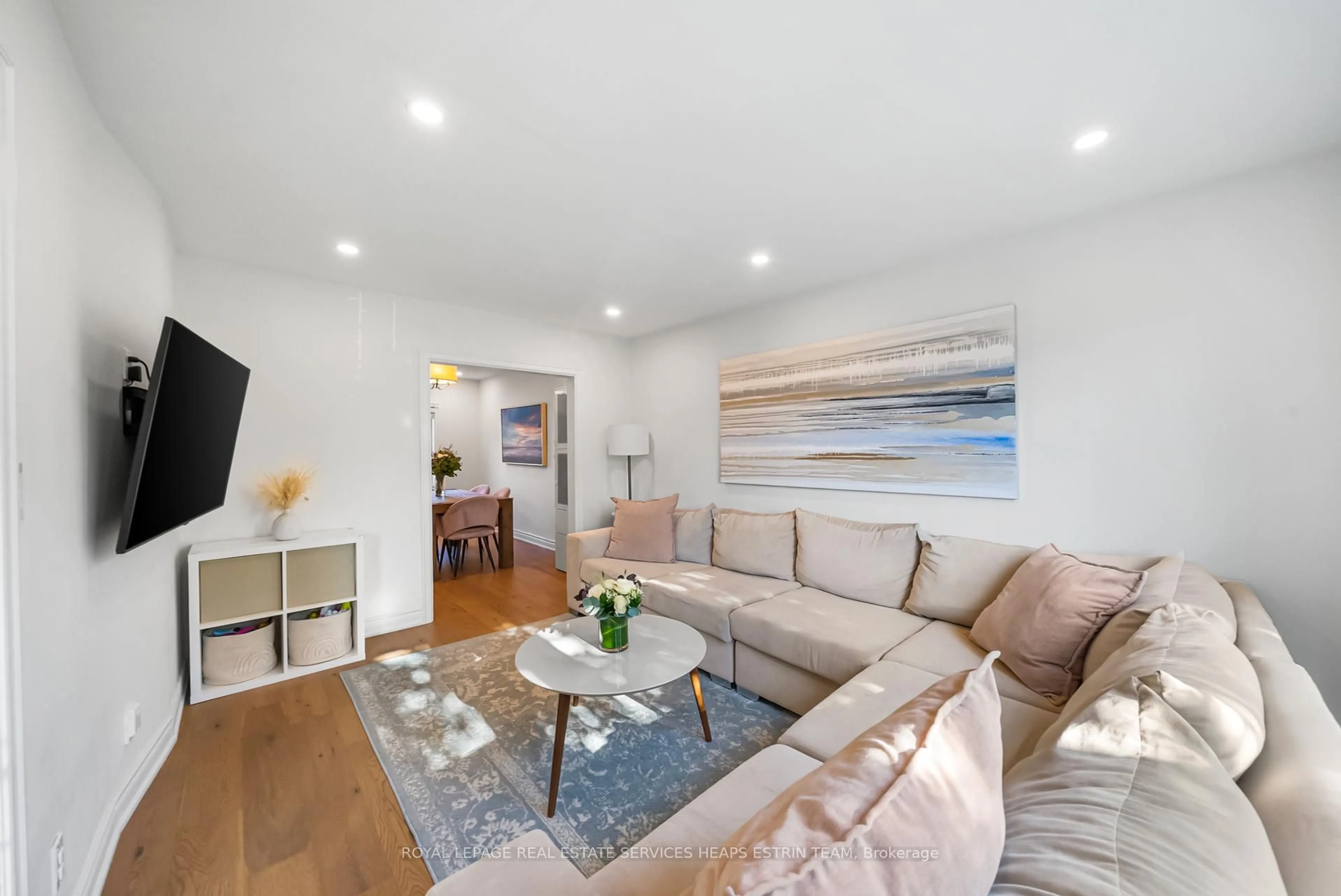 Living room with furniture, wood/laminate floor for 247 Blackthorn Ave, Toronto Ontario M6N 3H7