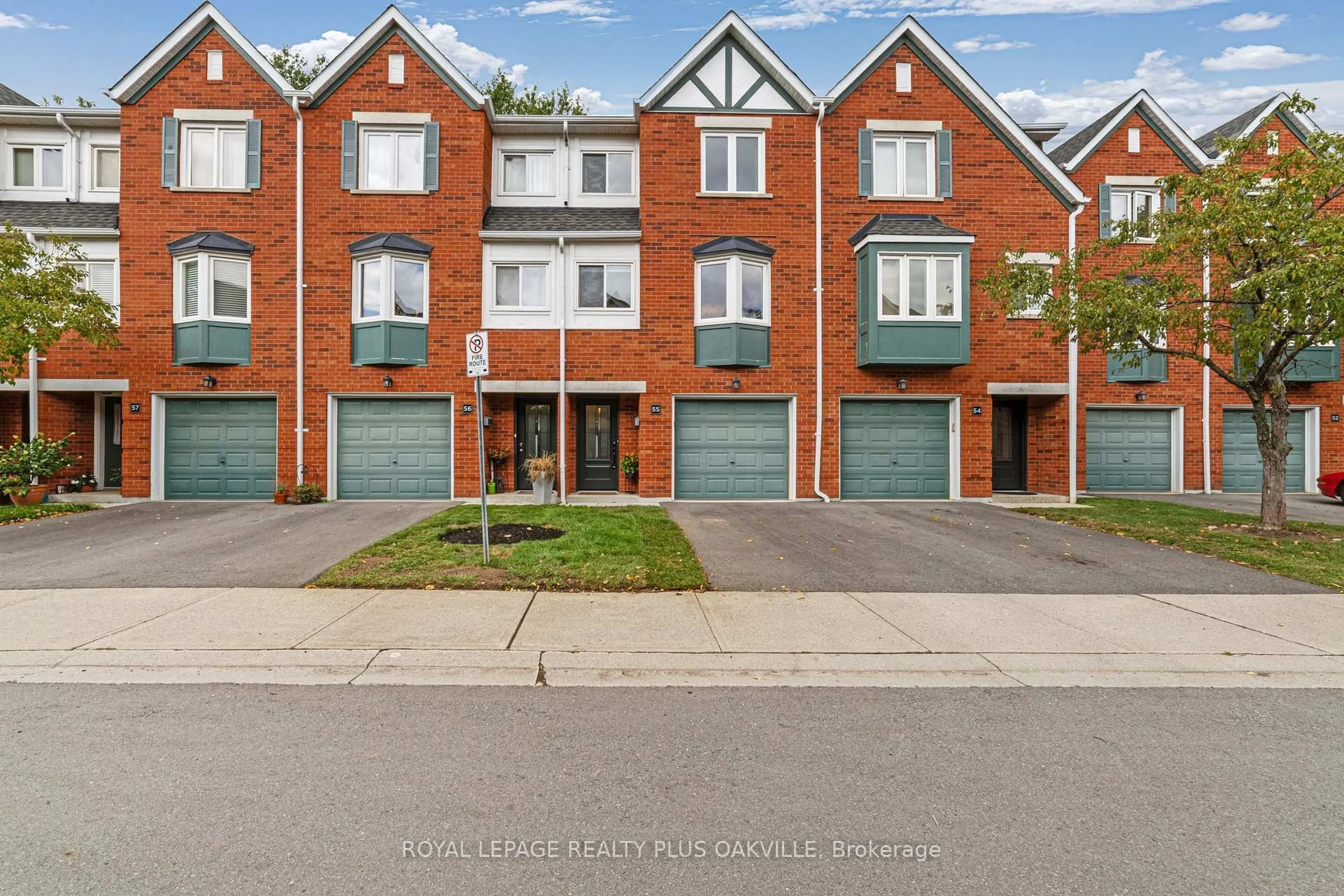 A pic from outside/outdoor area/front of a property/back of a property/a pic from drone, street for 2300 Brays Lane #55, Oakville Ontario L6M 3J9