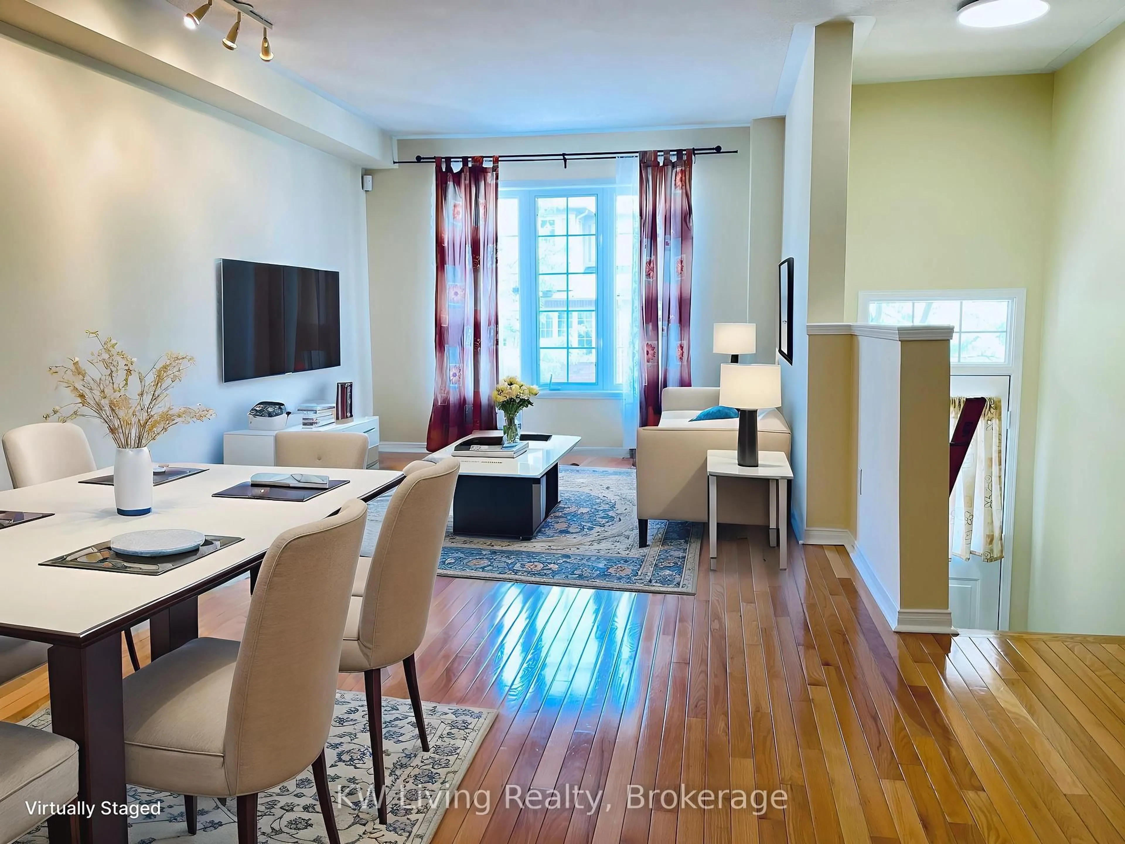 Living room with furniture, wood/laminate floor for 5055 Heatherleigh Ave #6, Mississauga Ontario L5V 2R6