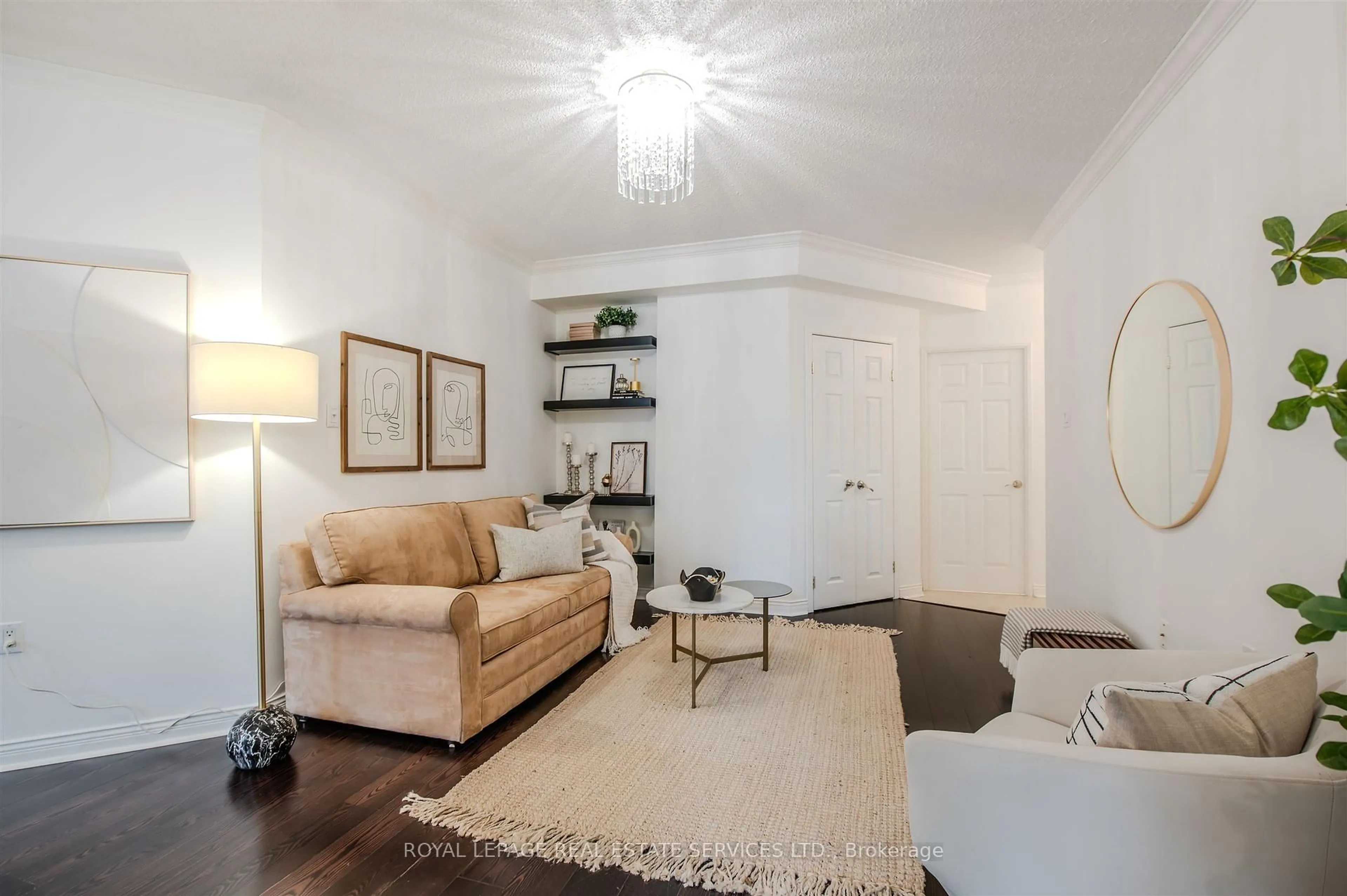 Living room with furniture, wood/laminate floor for 1110 Walden Circ #111, Mississauga Ontario L5J 4R3