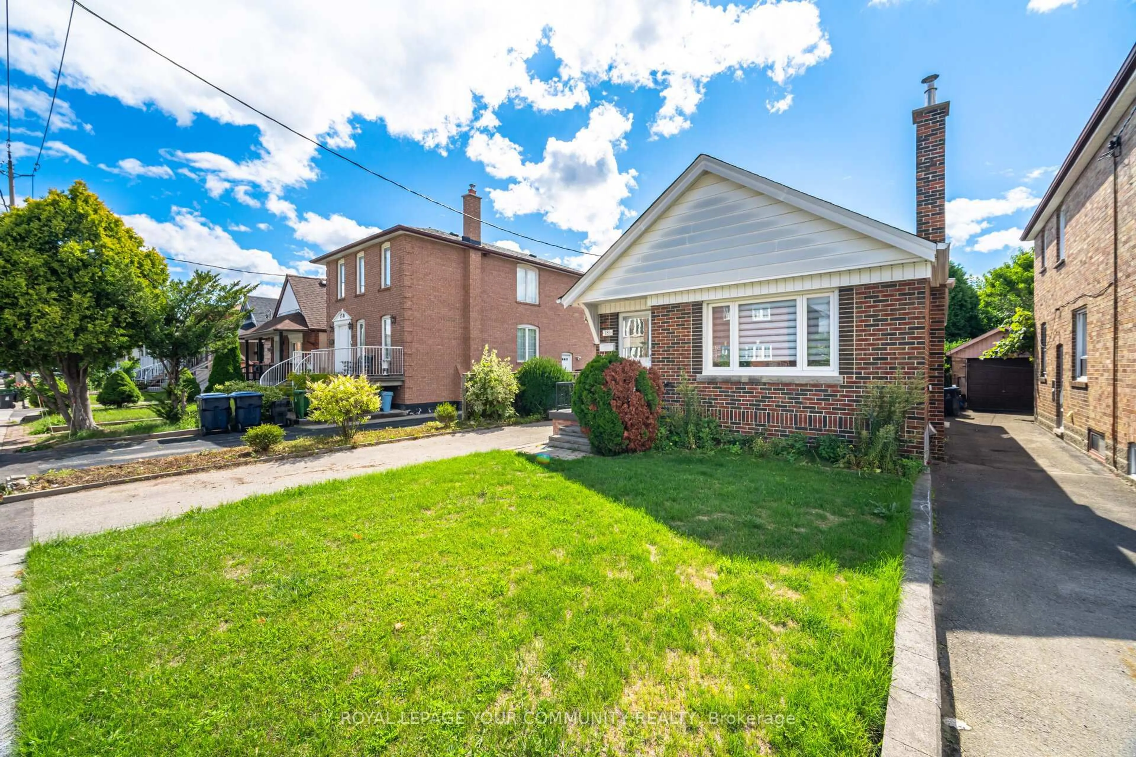 Home with brick exterior material, street for 185 Dunraven Dr, Toronto Ontario M6M 1H6