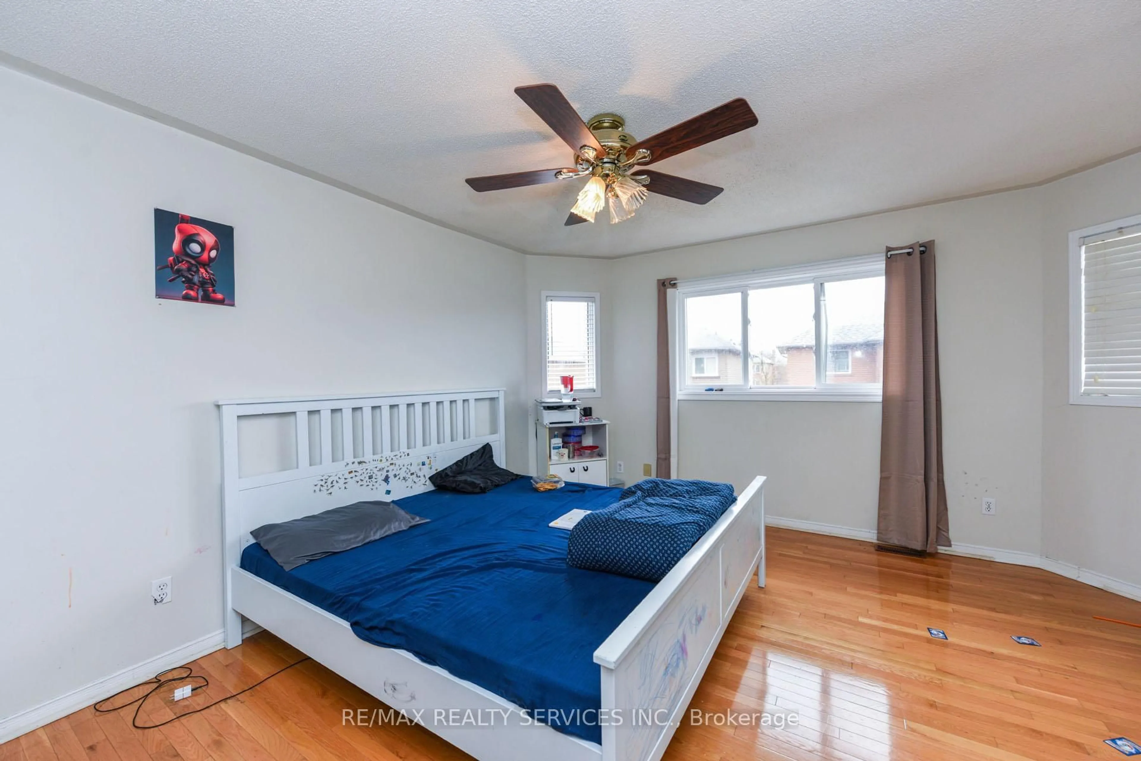 Bedroom with bed, wood/laminate floor for 33 Valonia Dr, Brampton Ontario L6V 4J2