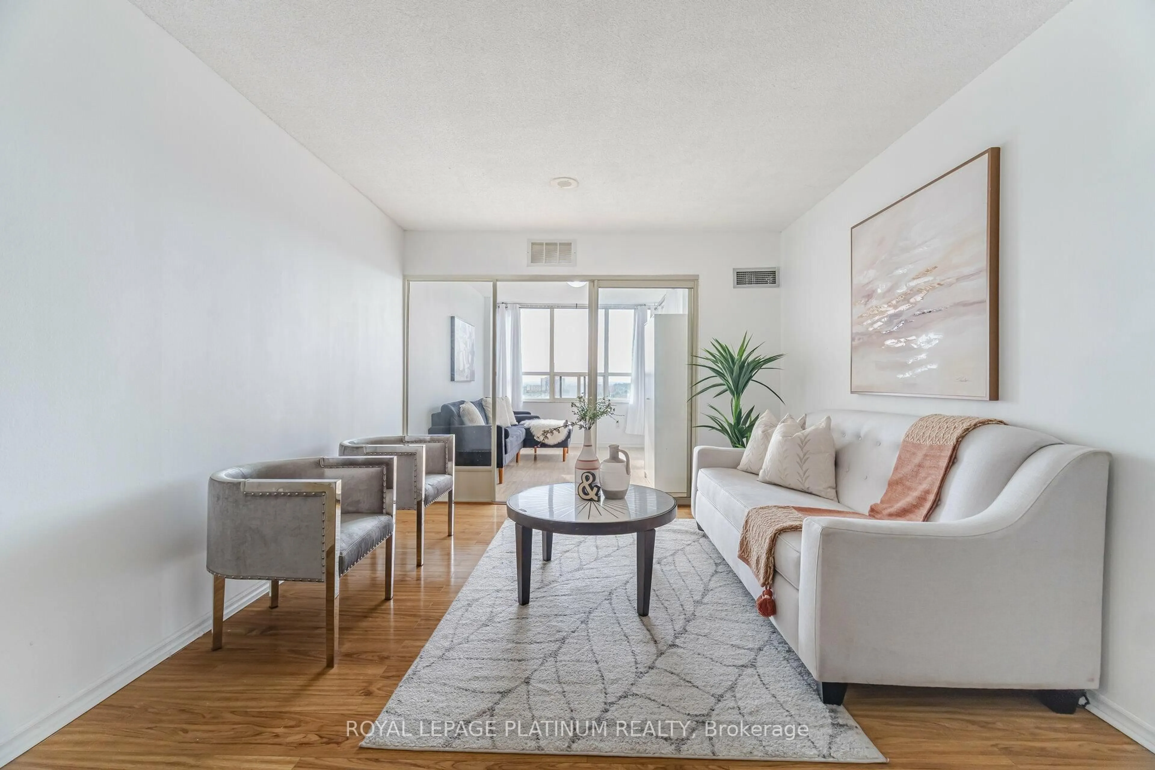 Living room with furniture, unknown for 30 Malta Ave #1005, Brampton Ontario L6Y 4S5