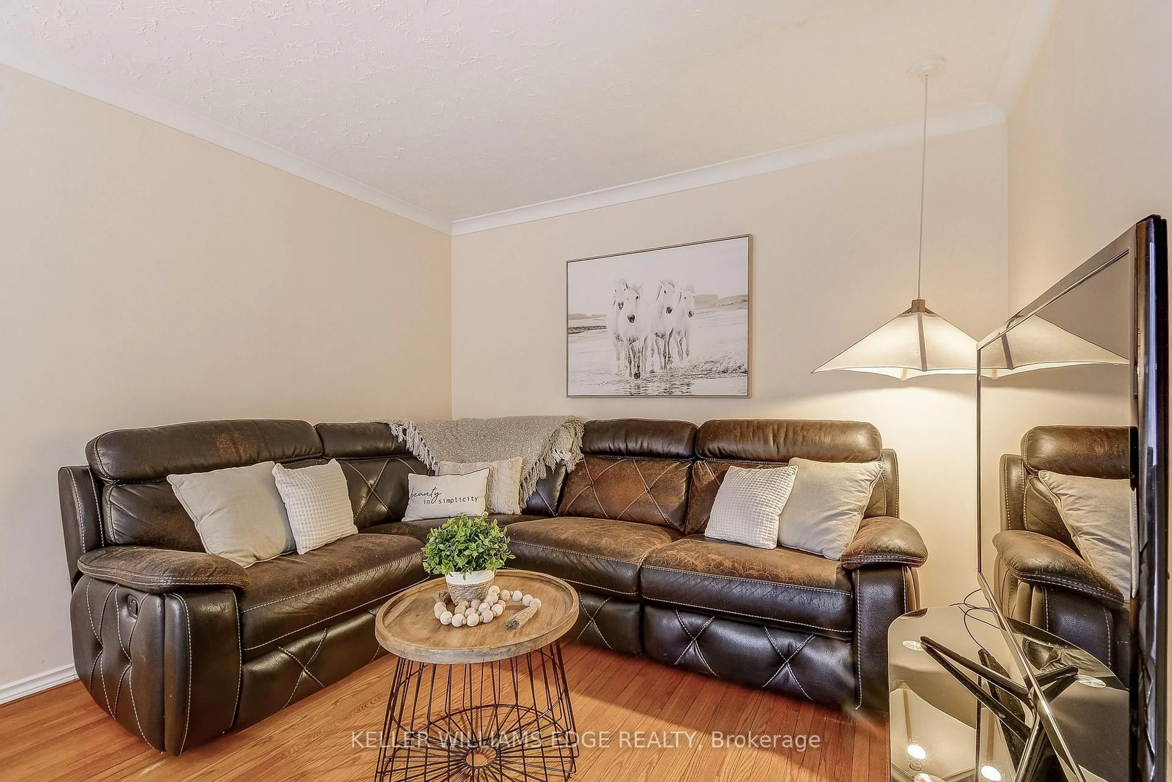 Living room with furniture, wood/laminate floor for 1470 Fisher Ave, Burlington Ontario L7P 2L8