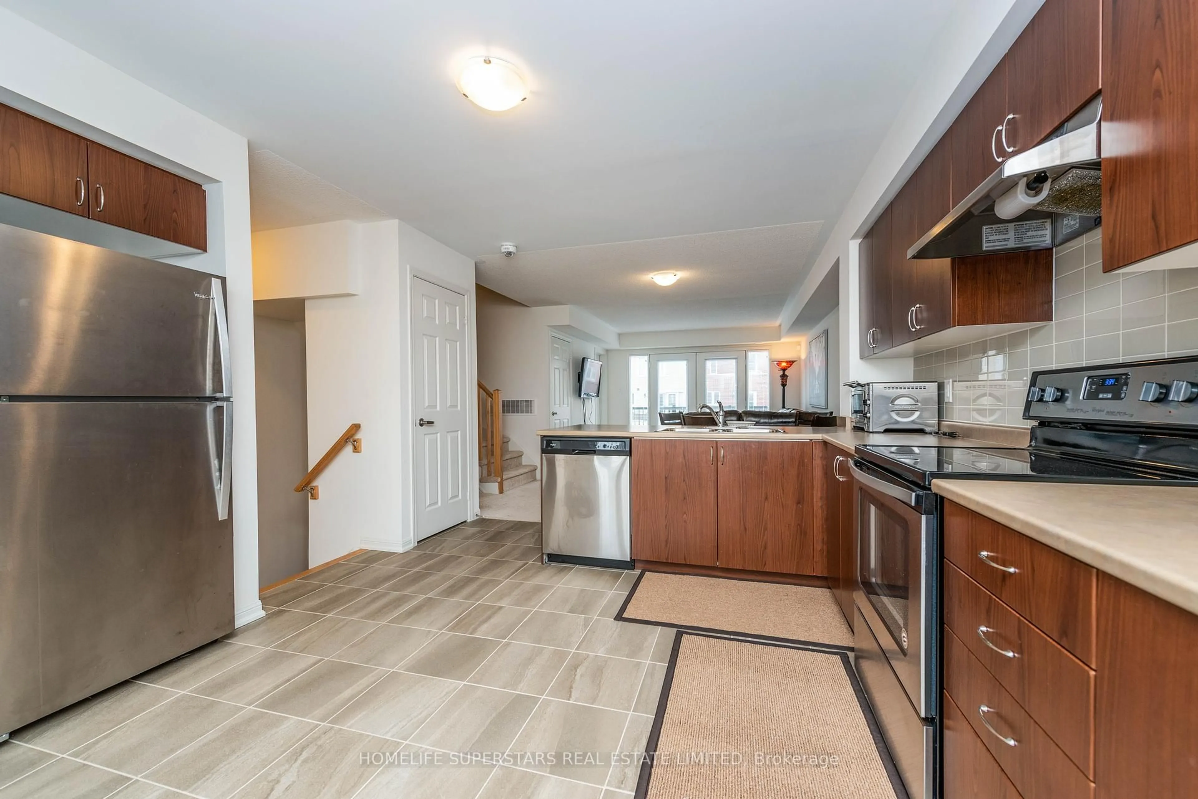 Open concept kitchen, ceramic/tile floor for 250 Sunny Meadow Blvd #210, Brampton Ontario L6R 3Y6