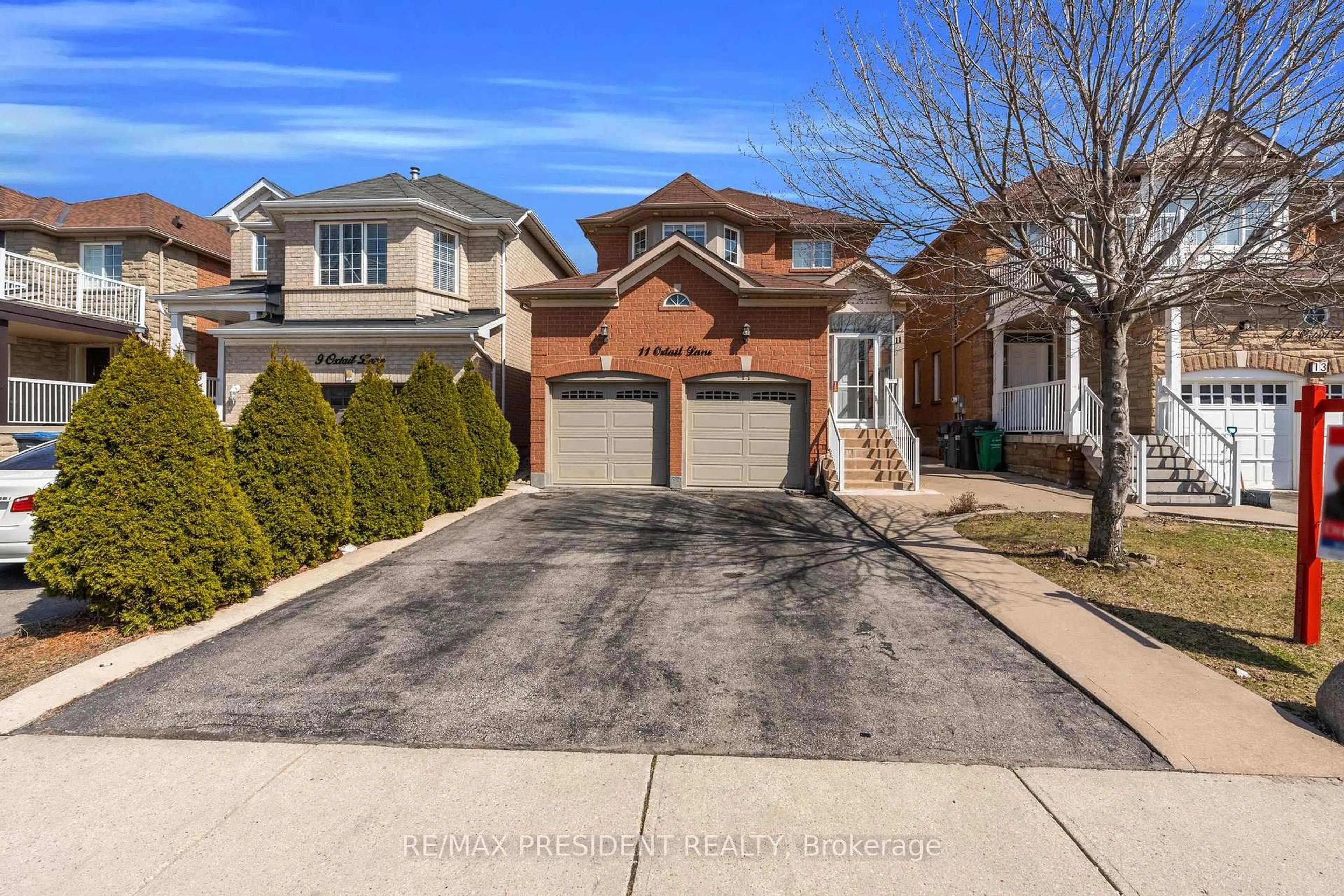 Home with brick exterior material, street for 11 Oxtail Lane, Brampton Ontario L6X 5E2
