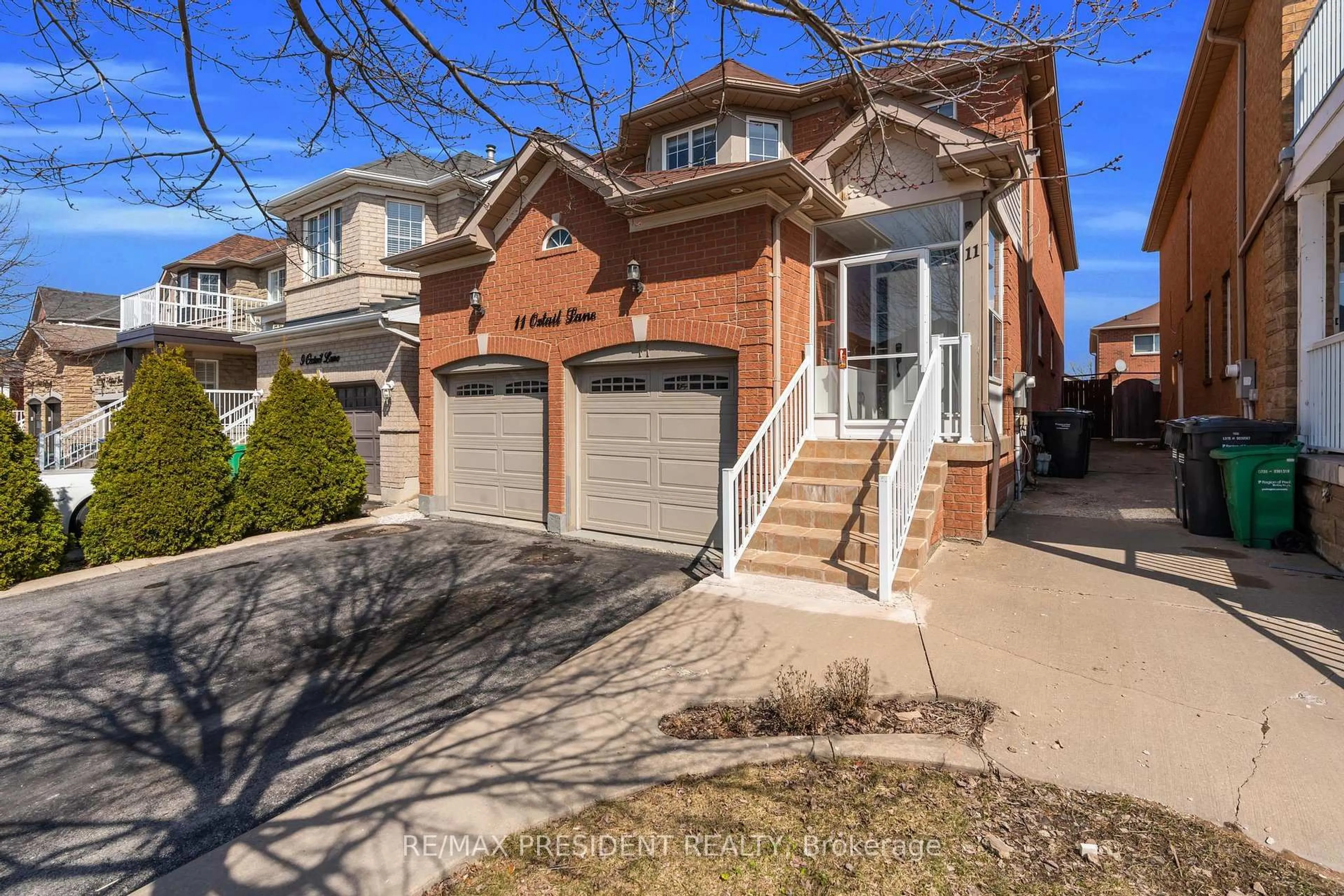 Home with brick exterior material, street for 11 Oxtail Lane, Brampton Ontario L6X 5E2