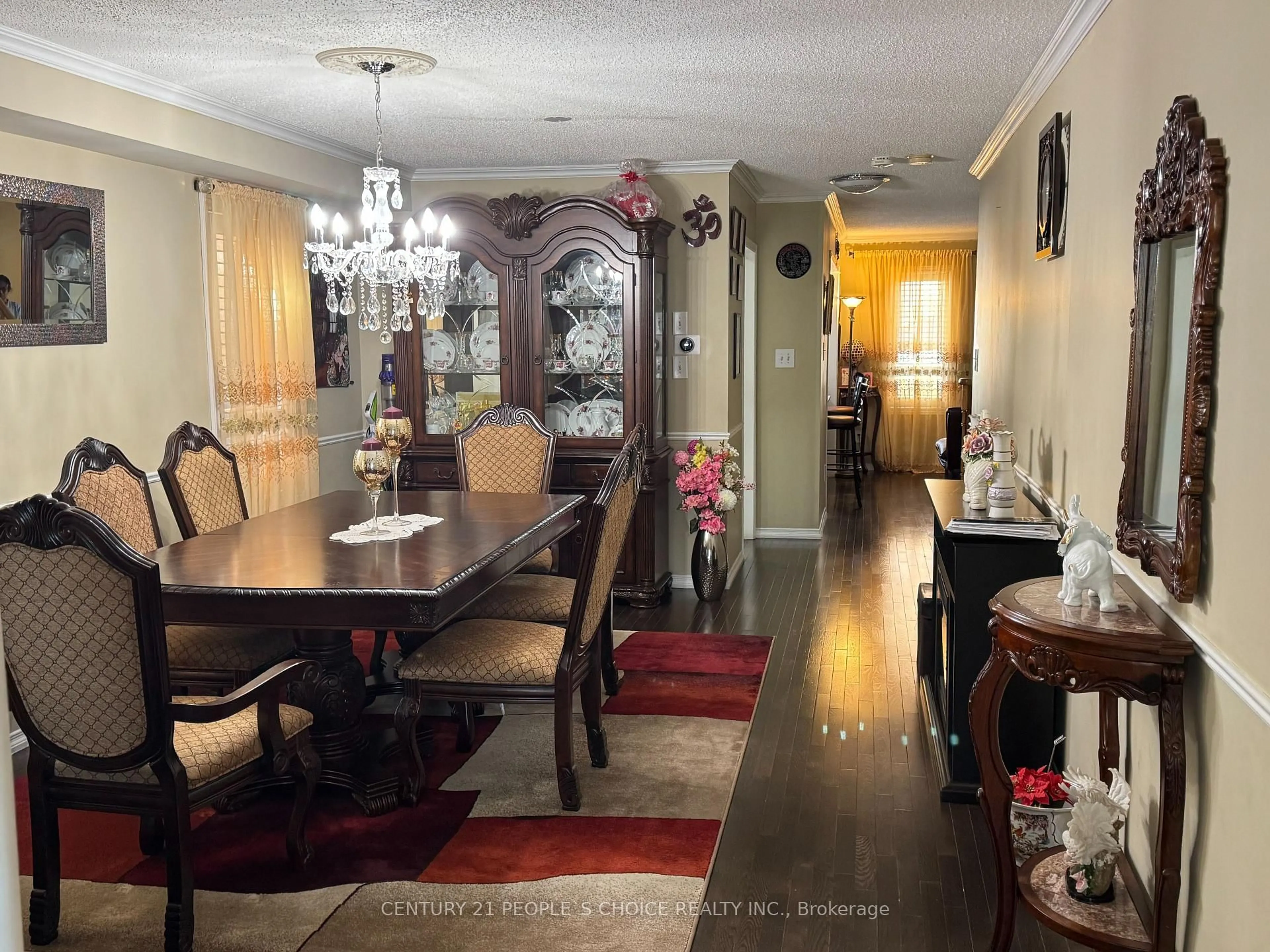 Dining room, wood/laminate floor for 124 Heartleaf Cres, Brampton Ontario L7A 2C1