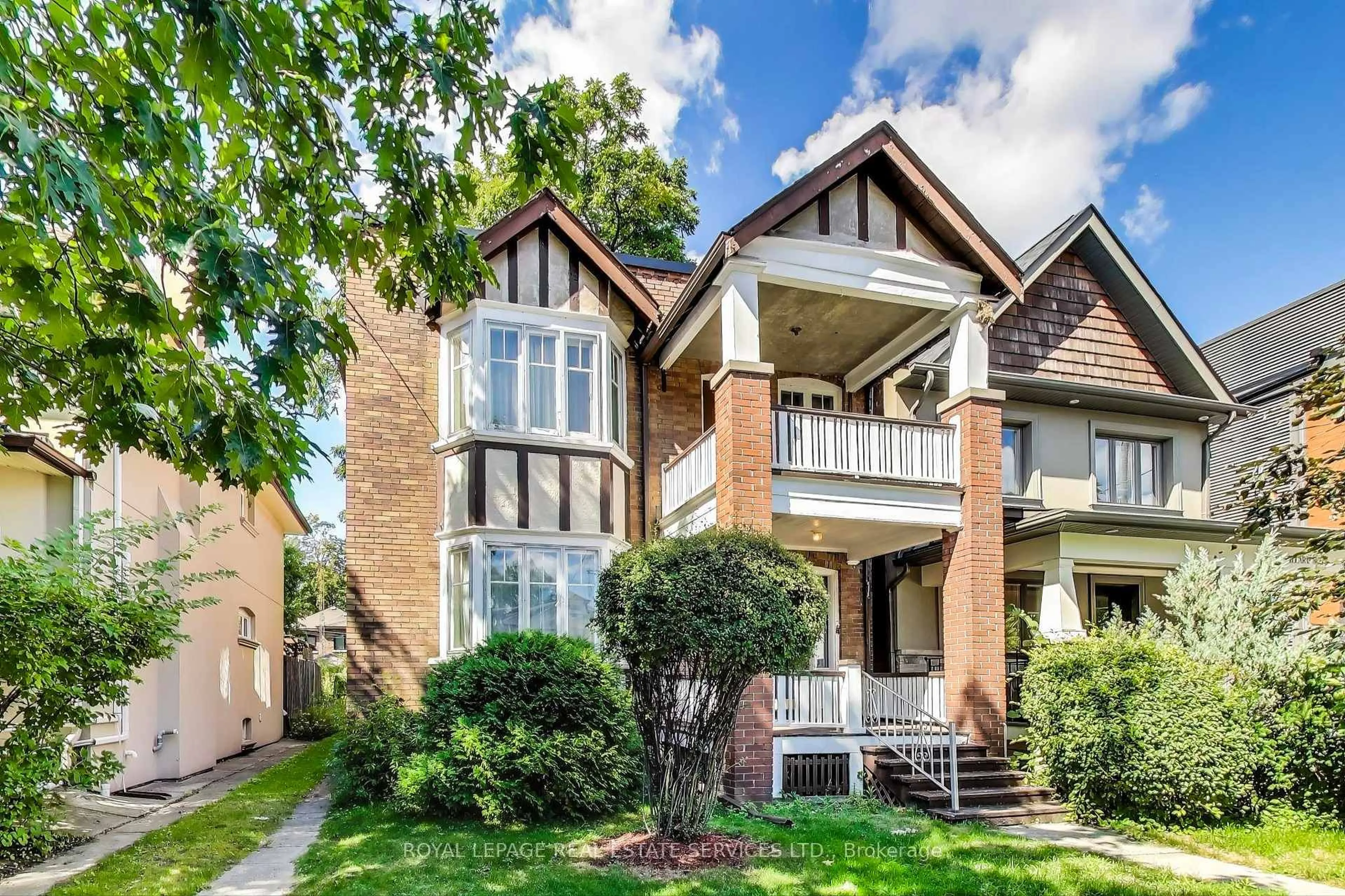 Home with brick exterior material, street for 418 Willard Ave, Toronto Ontario M6S 3R5