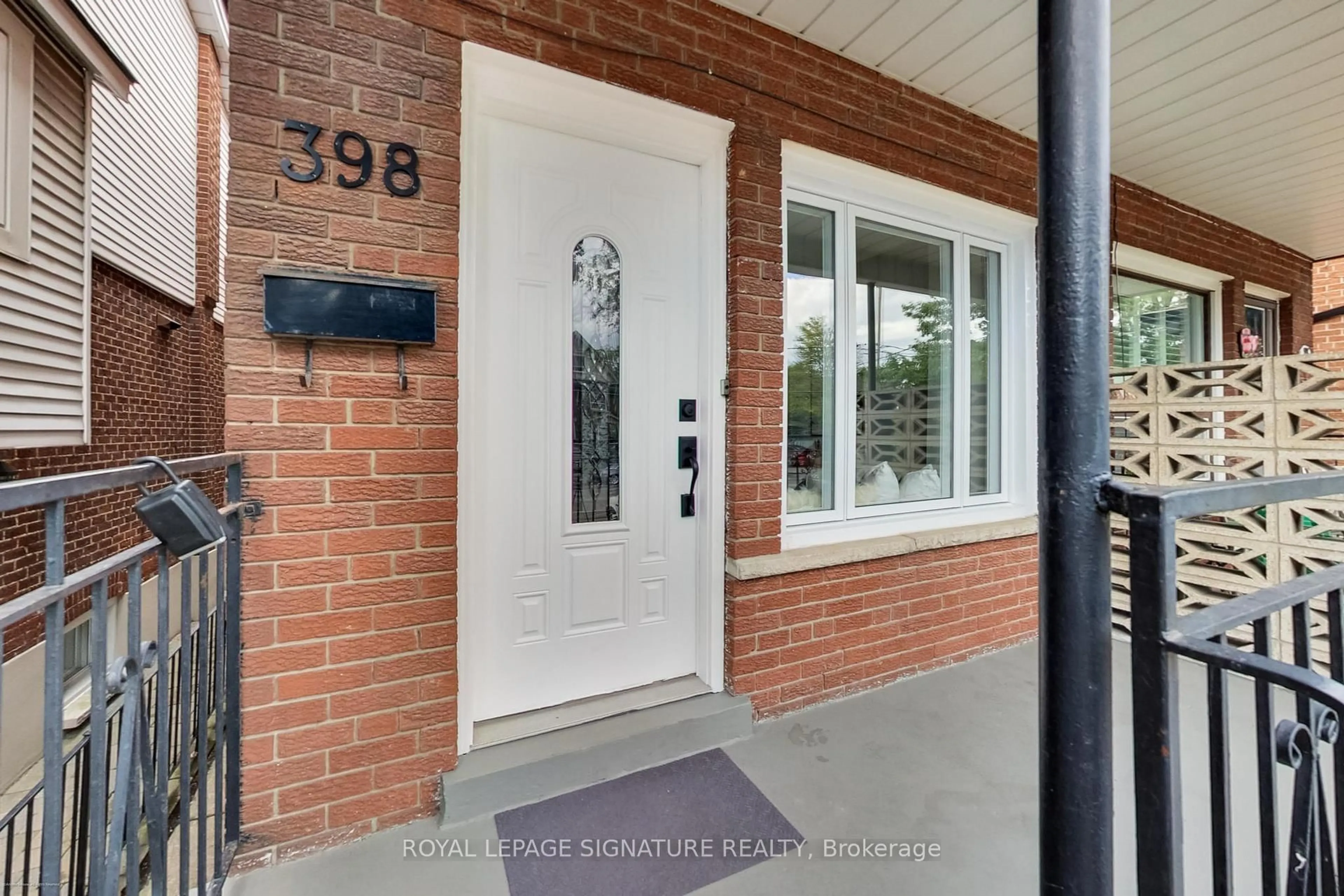 Home with brick exterior material, street for 398 Annette St, Toronto Ontario M6P 1R6