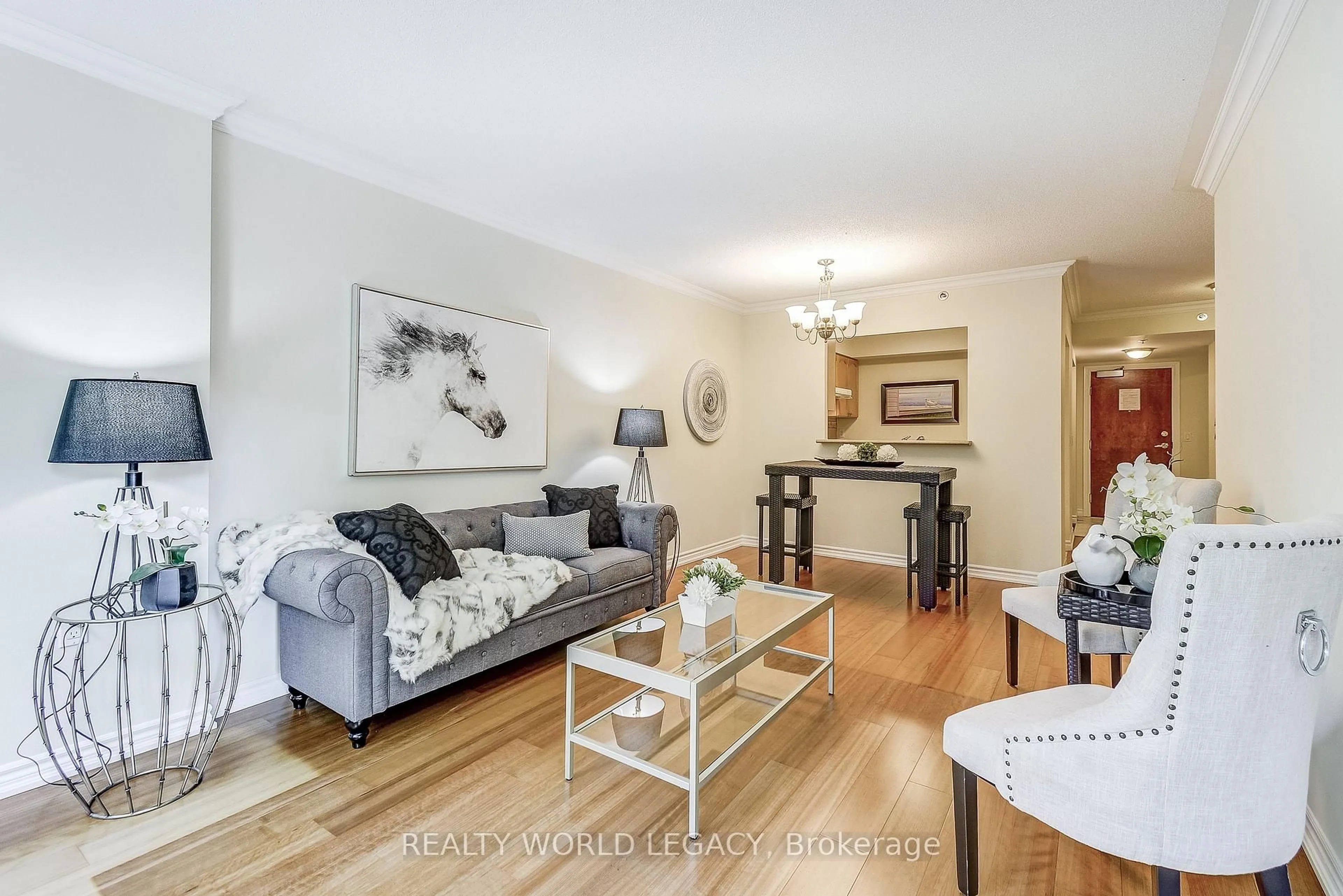 Living room with furniture, wood/laminate floor for 100 Burloak Dr #1308, Burlington Ontario L7L 6P6