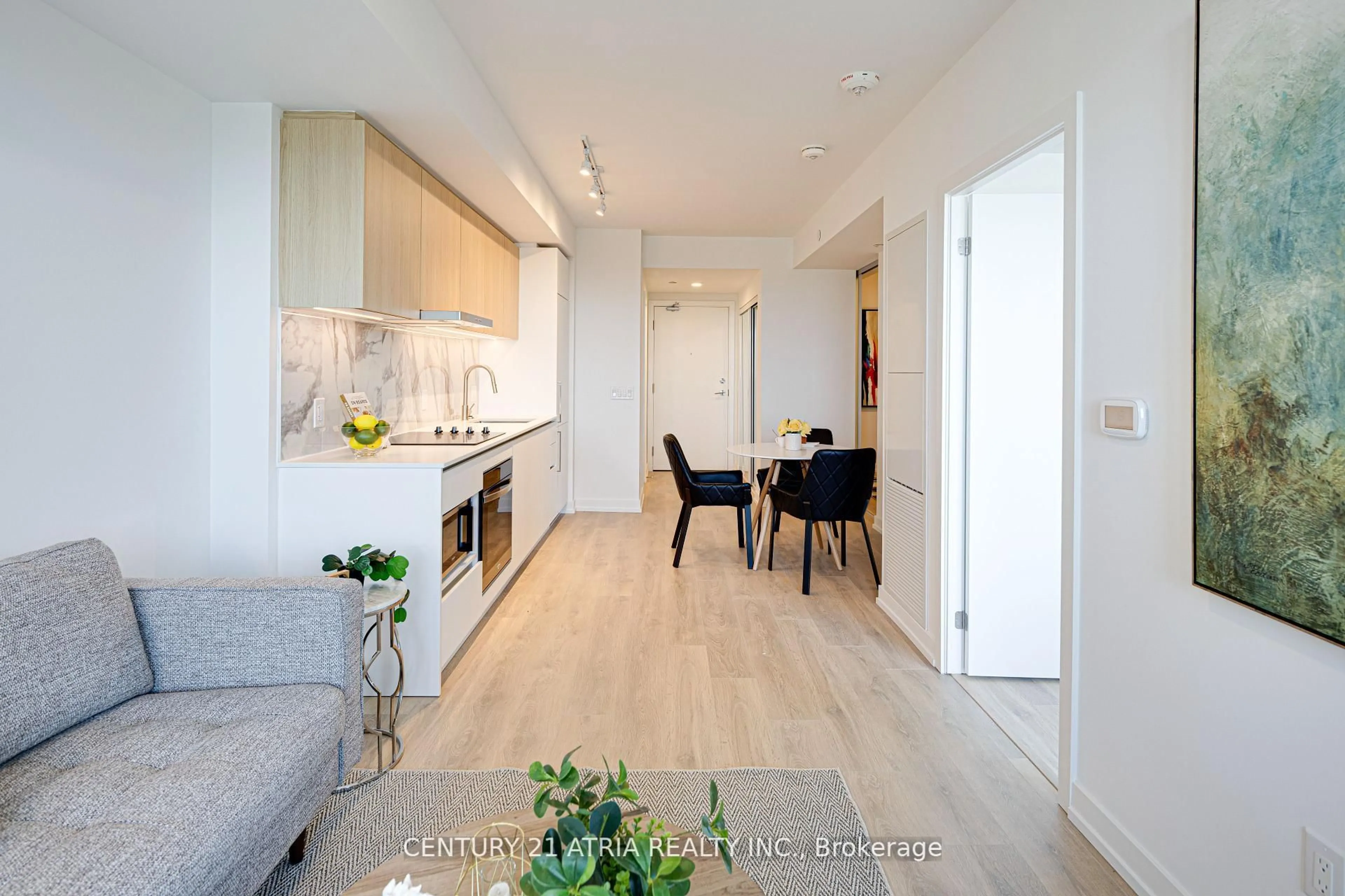 Open concept kitchen, wood/laminate floor for 1100 Sheppard Ave #822, Toronto Ontario M3K 0E4