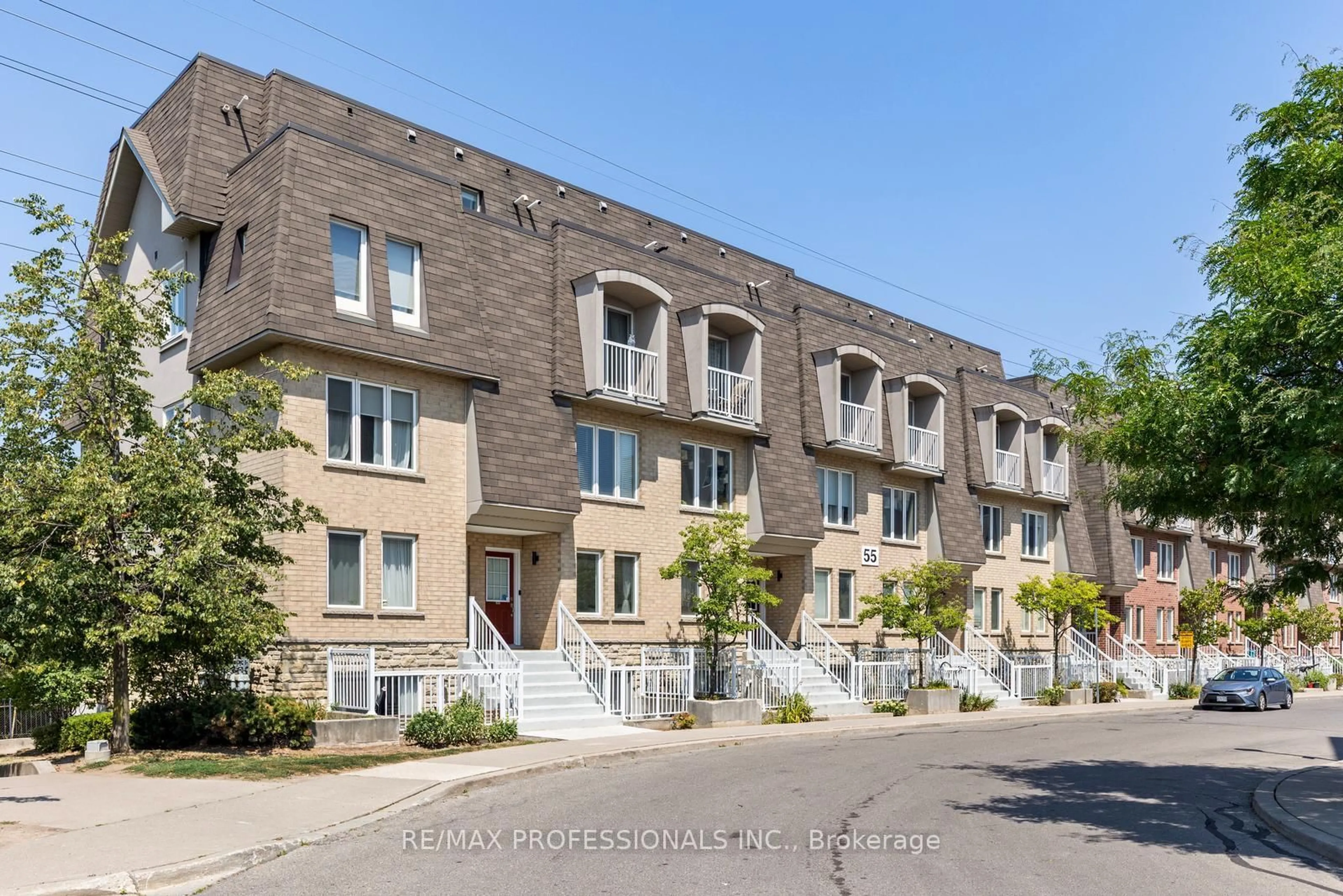 Home with brick exterior material, street for 55 Turntable Cres #70, Toronto Ontario M6H 4K8