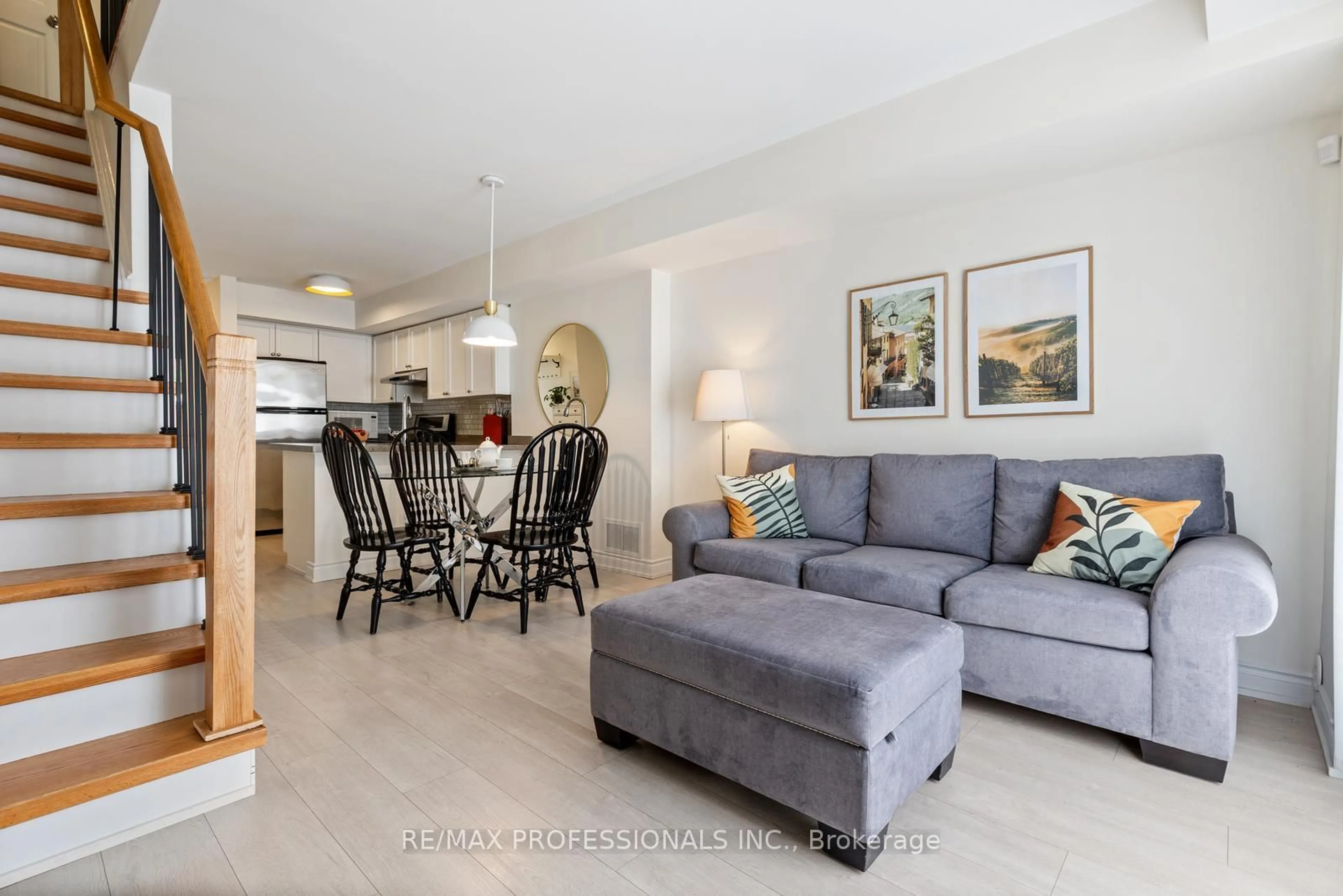 Living room with furniture, ceramic/tile floor for 55 Turntable Cres #70, Toronto Ontario M6H 4K8