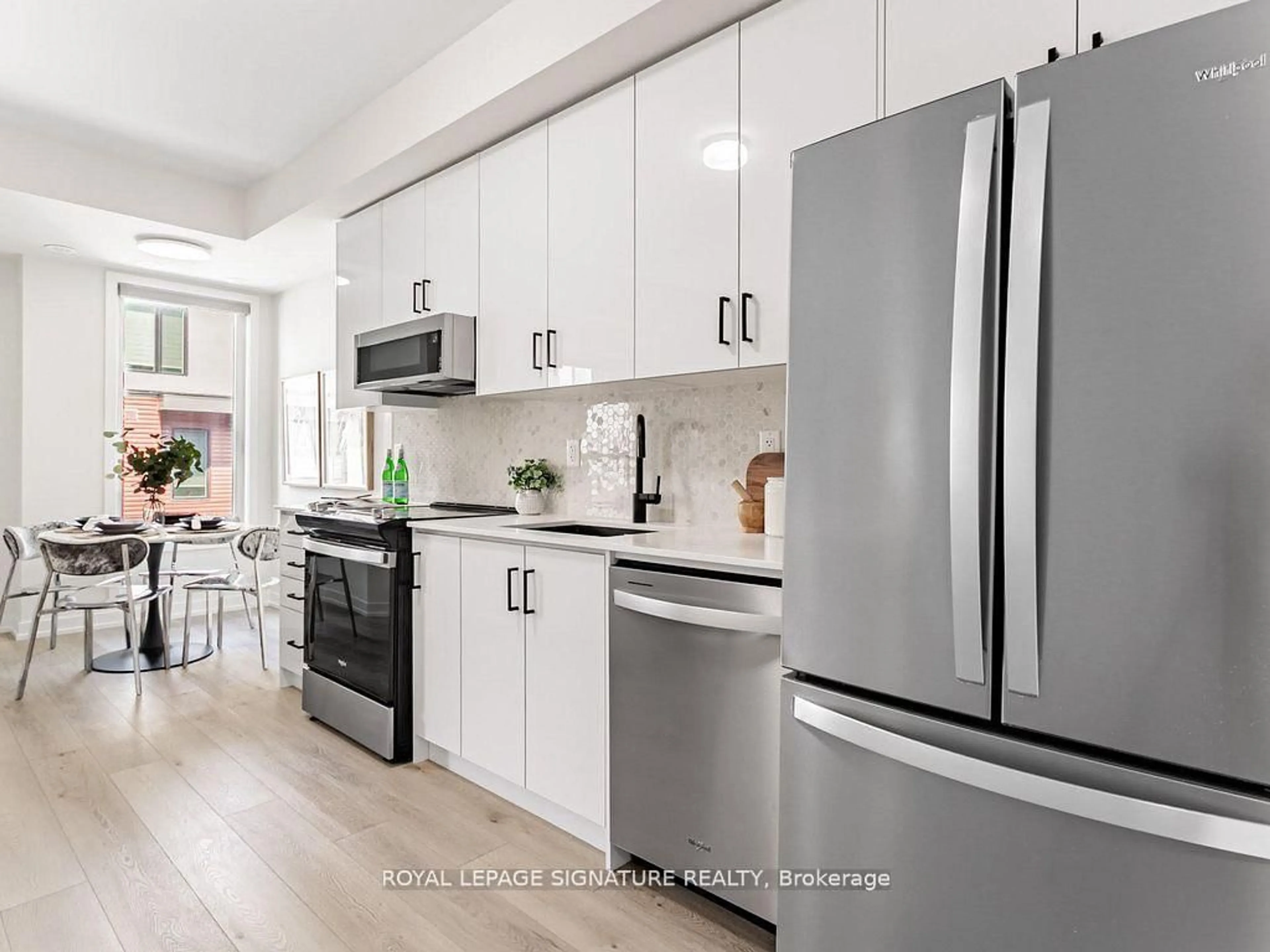 Open concept kitchen, ceramic/tile floor for 3550 Colonial Dr #24, Mississauga Ontario L5L 0C1