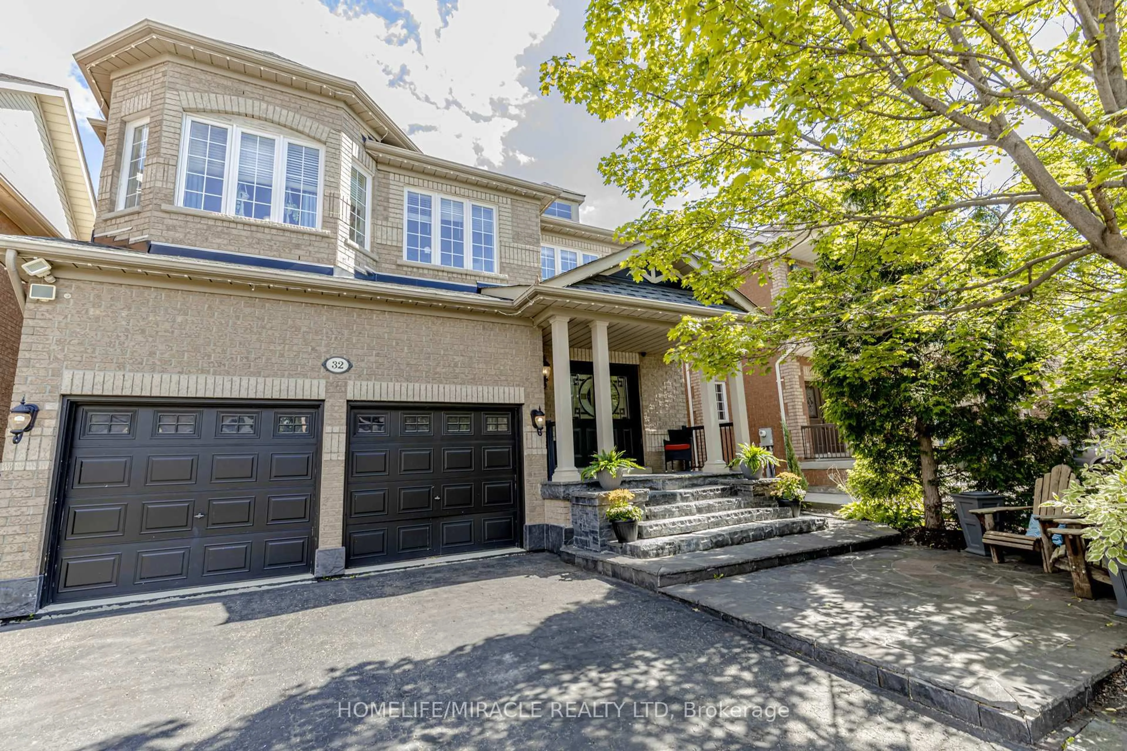 Home with brick exterior material, street for 32 Masters Green Cres, Brampton Ontario L7A 3K6