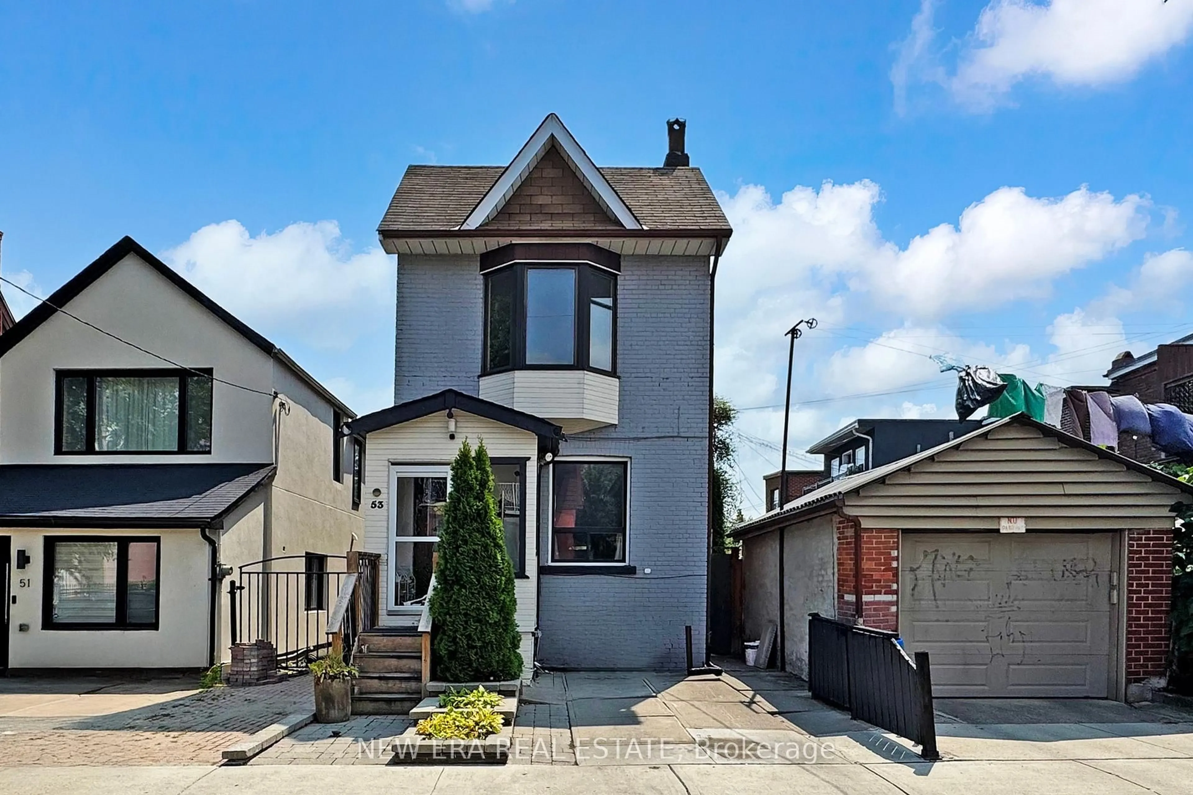 Home with brick exterior material, street for 53 Burnfield Ave, Toronto Ontario M6G 1Y4