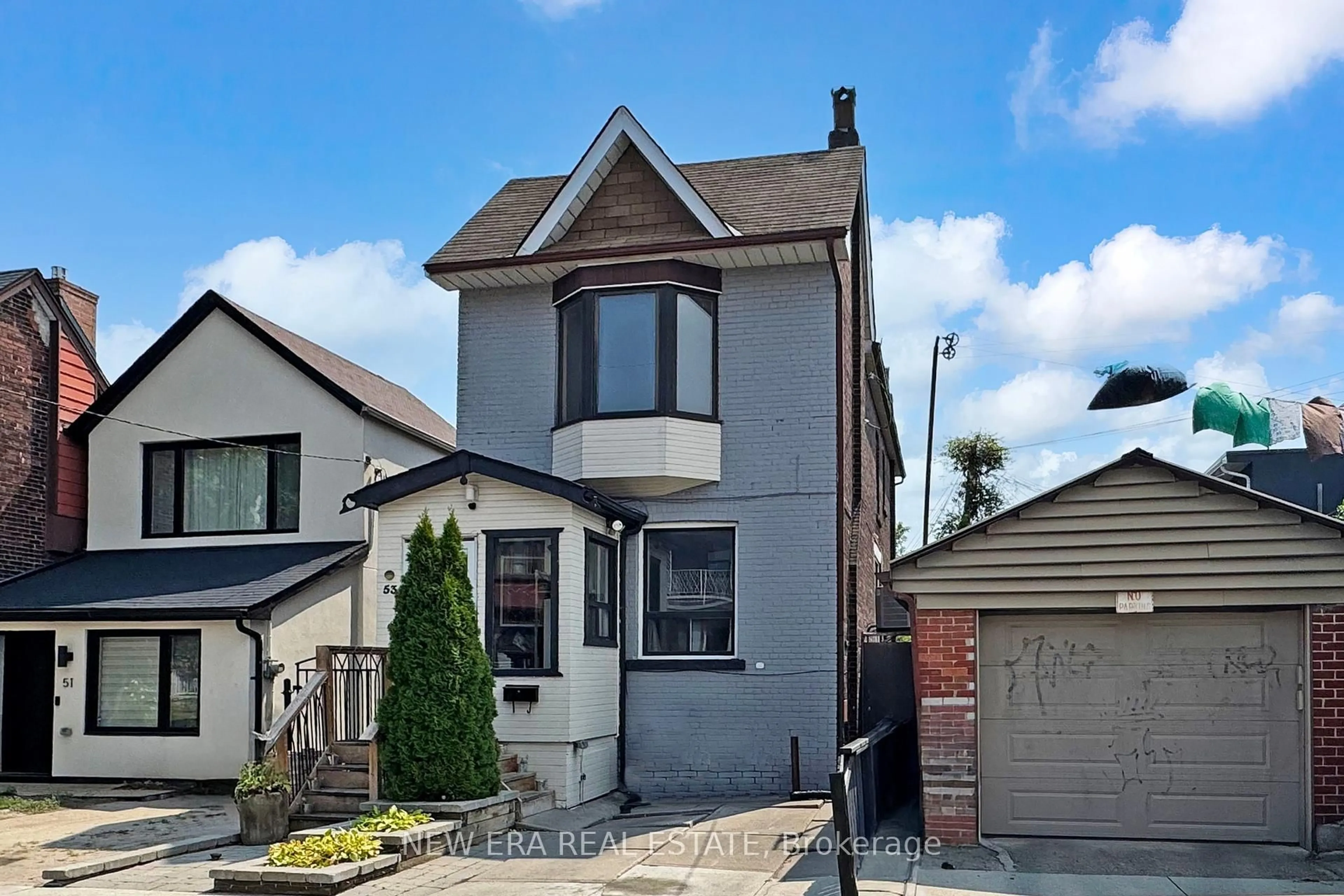 Home with brick exterior material, street for 53 Burnfield Ave, Toronto Ontario M6G 1Y4