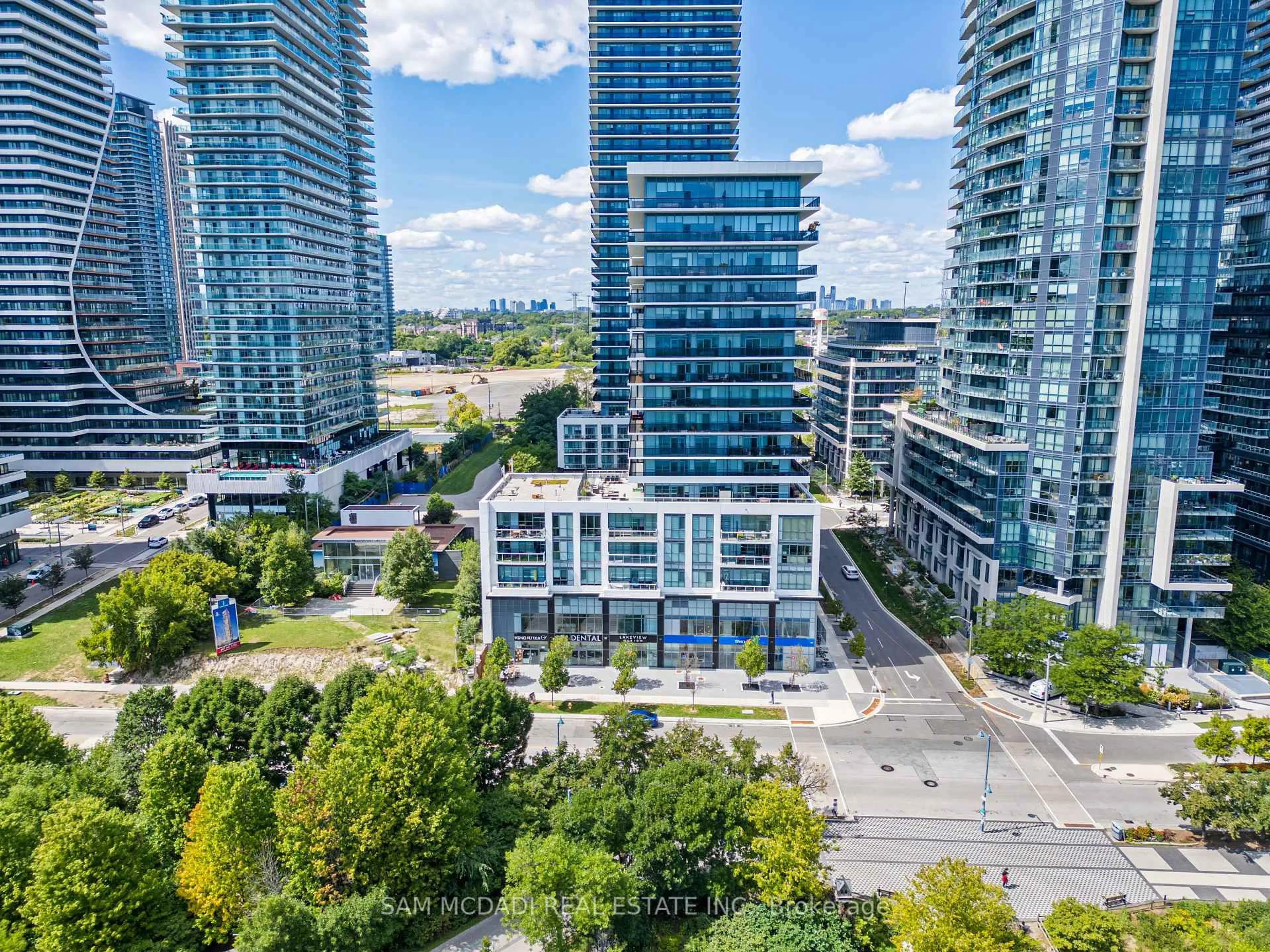 A pic from outside/outdoor area/front of a property/back of a property/a pic from drone, city buildings view from balcony for 65 Annie Craig Dr #1405, Toronto Ontario M8V 0C4