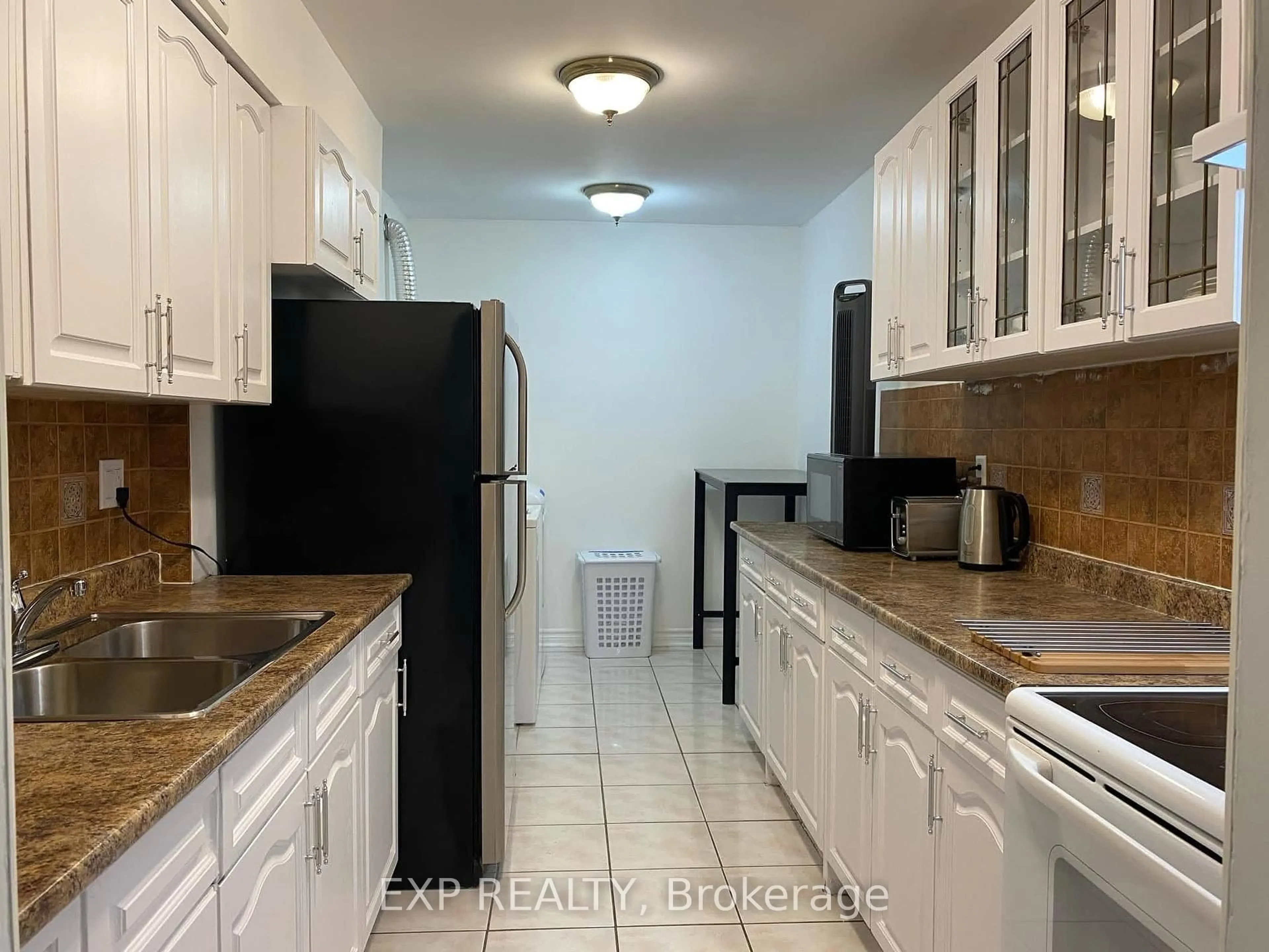 Standard kitchen, ceramic/tile floor for 320 Dixon Rd #1813, Toronto Ontario M9R 1S8