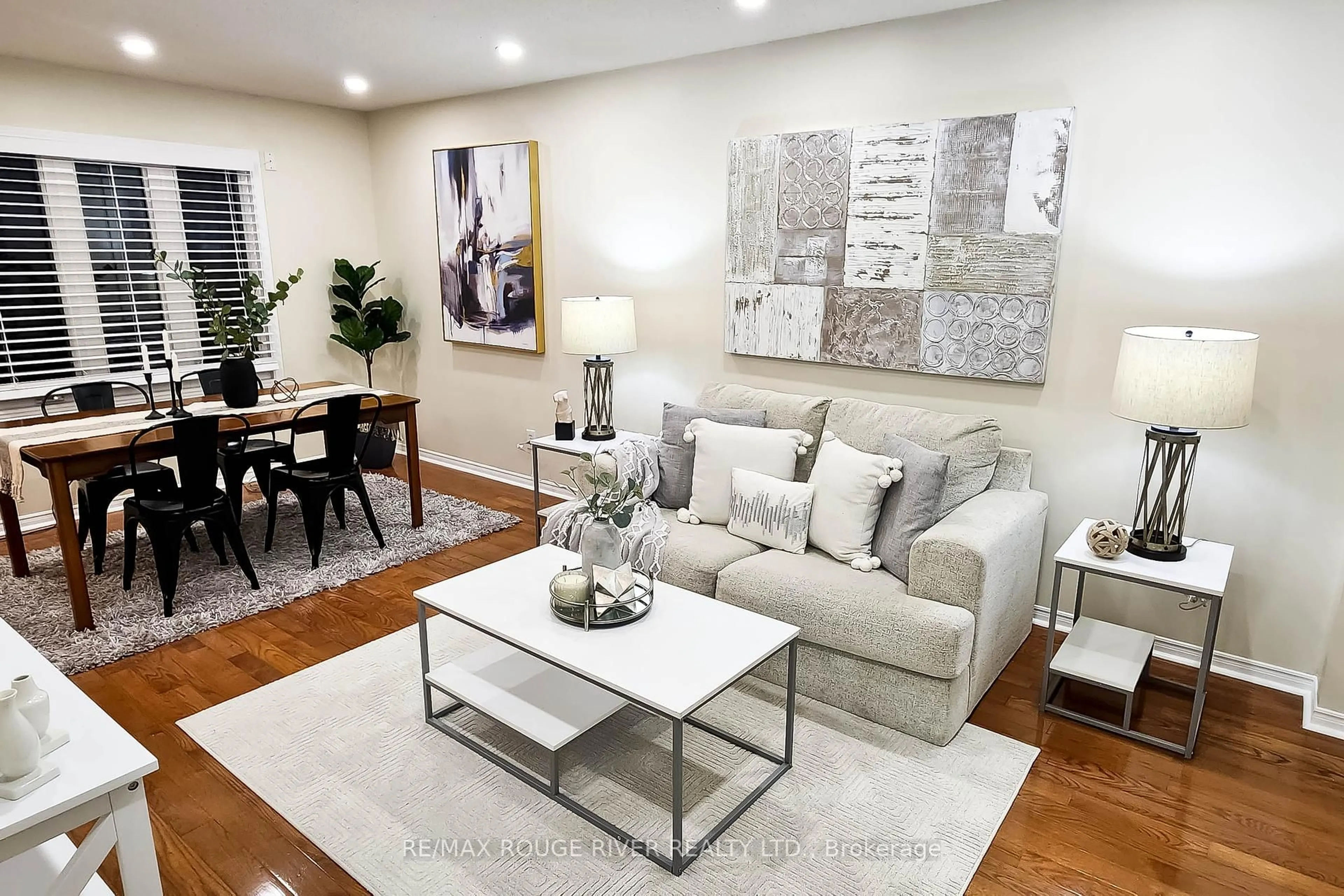 Living room with furniture, wood/laminate floor for 307 Michael Dr, Orangeville Ontario L9W 4M5