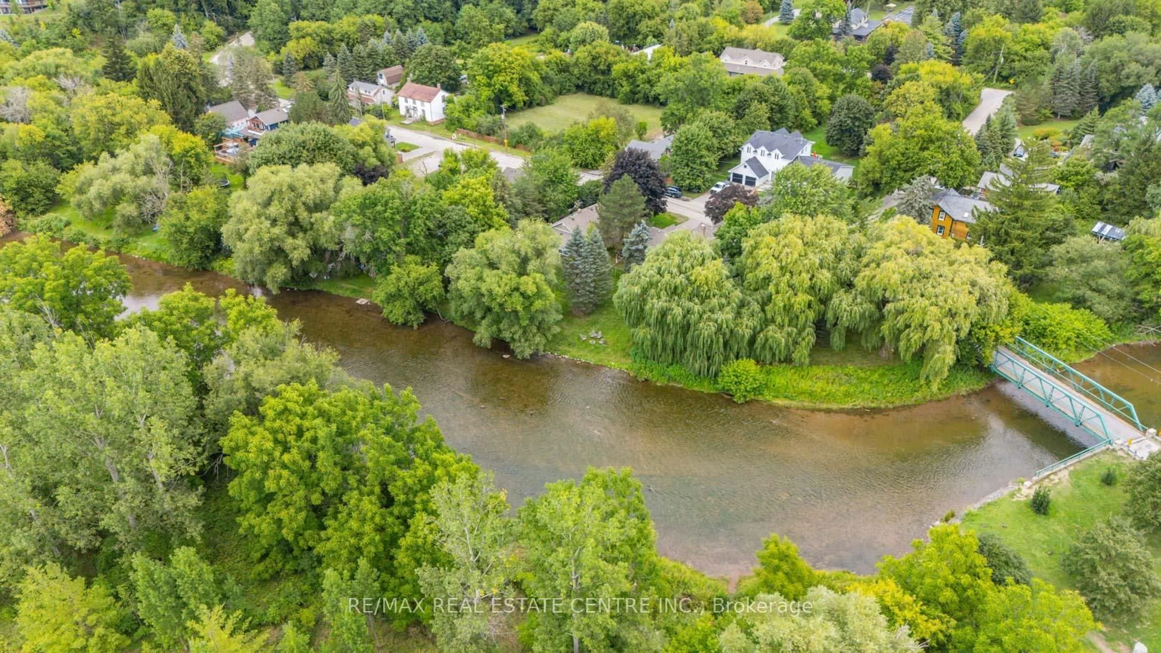A pic from outside/outdoor area/front of a property/back of a property/a pic from drone, water/lake/river/ocean view for 7736 Churchville Rd, Brampton Ontario L6Y 0H5