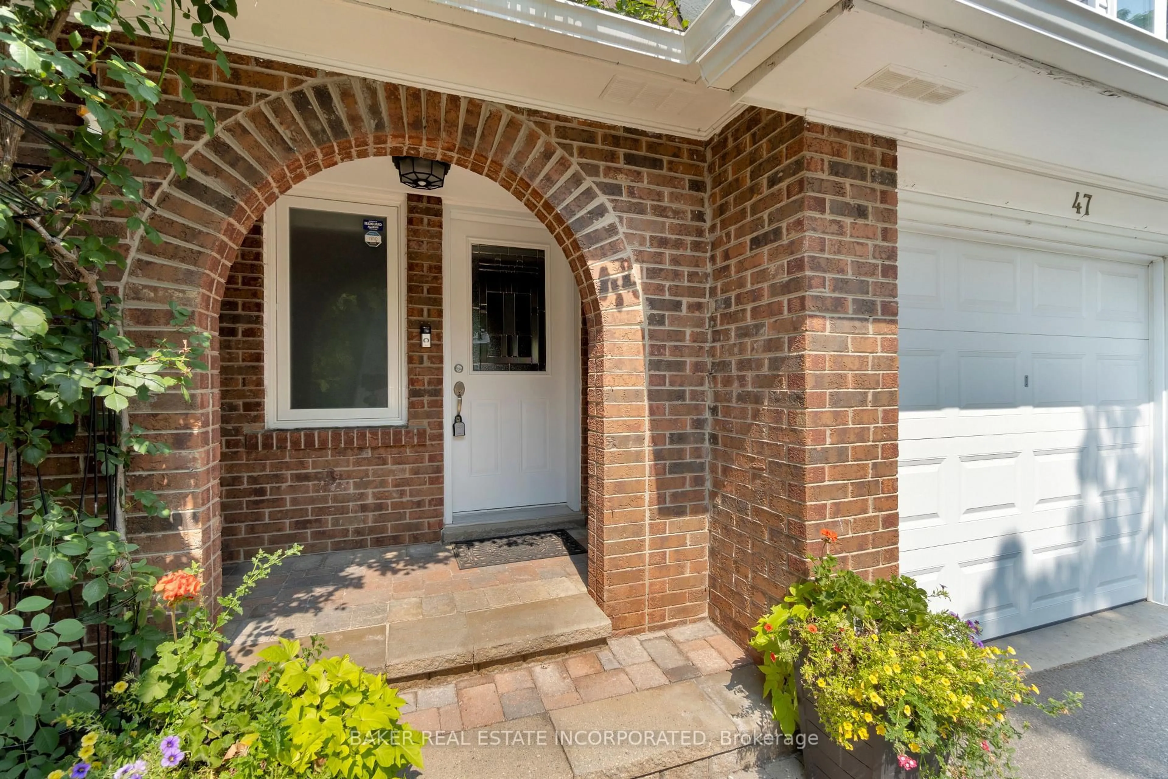 Home with brick exterior material, street for 333 Meadows Blvd #47, Mississauga Ontario L4Z 1G9