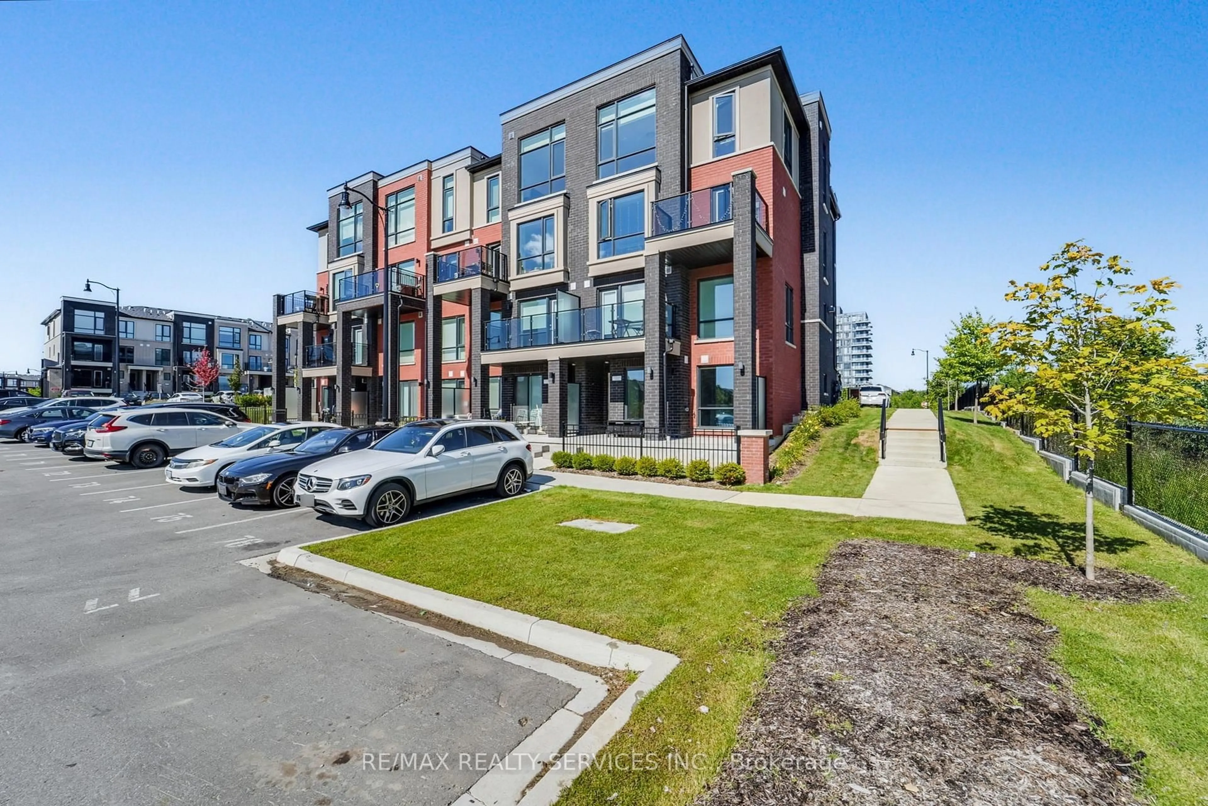A pic from outside/outdoor area/front of a property/back of a property/a pic from drone, street for 155 Veterans Dr #13, Brampton Ontario L7A 5L2