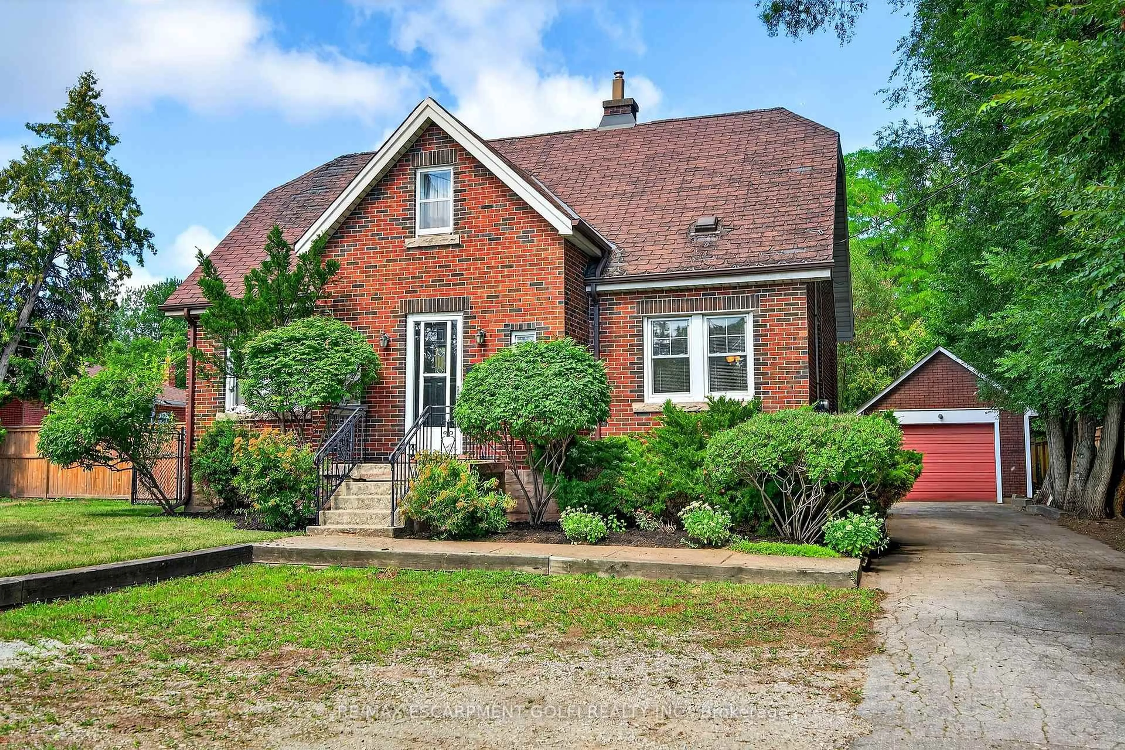 Home with brick exterior material, street for 1025 KING Rd, Burlington Ontario L7T 3L5