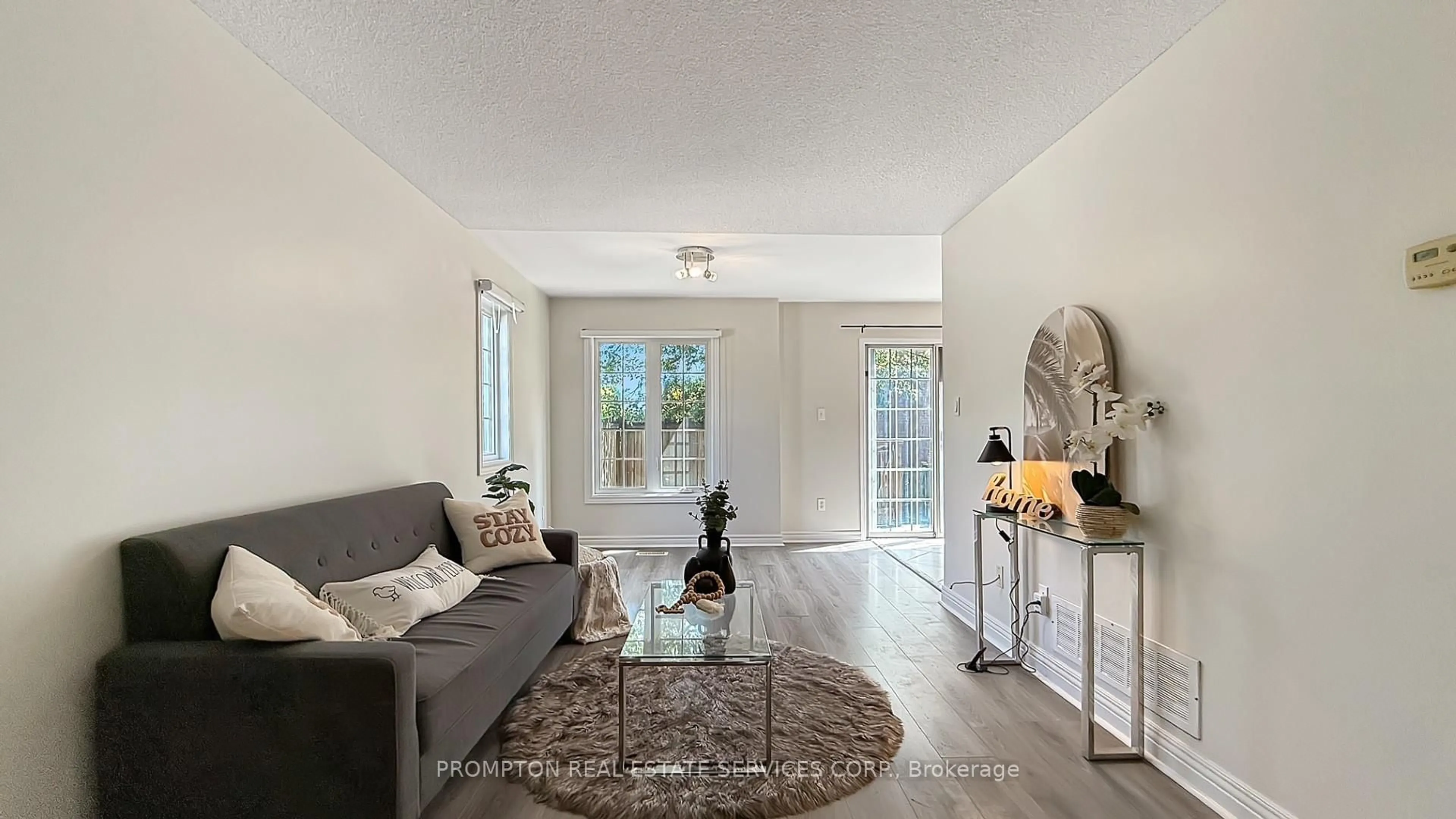 Living room with furniture, unknown for 6950 Tenth Line W #82, Mississauga Ontario L5N 6Y1