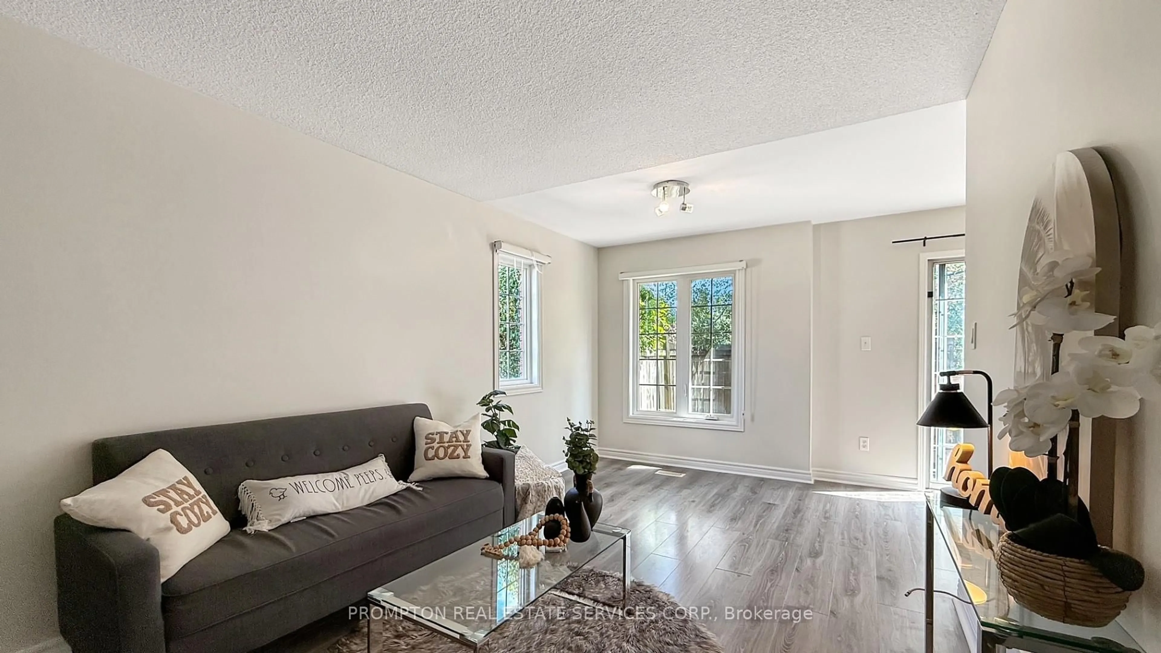 Living room with furniture, unknown for 6950 Tenth Line W #82, Mississauga Ontario L5N 6Y1