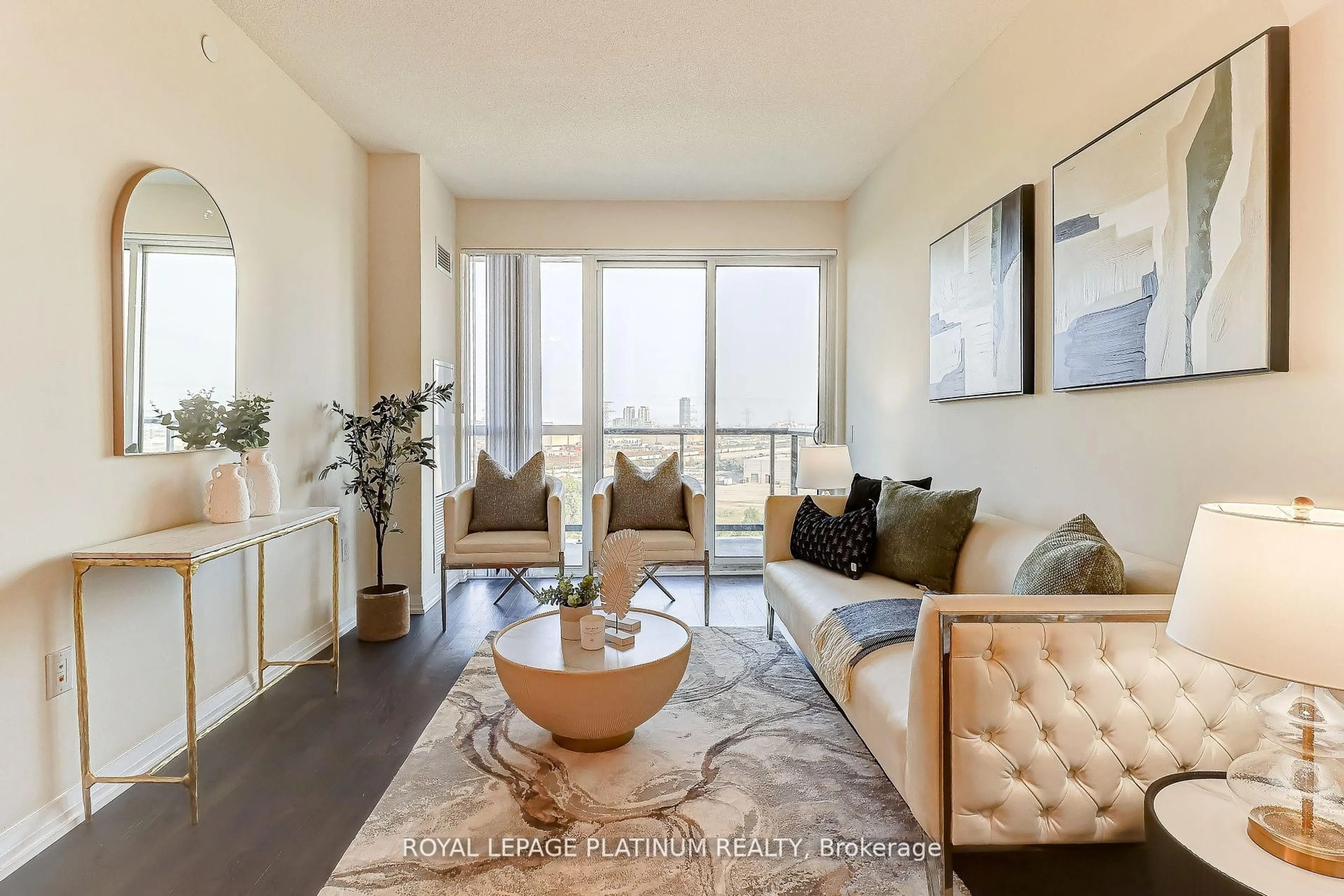 Living room with furniture, unknown for 50 Thomas Riley Rd #703, Toronto Ontario M9B 0C5