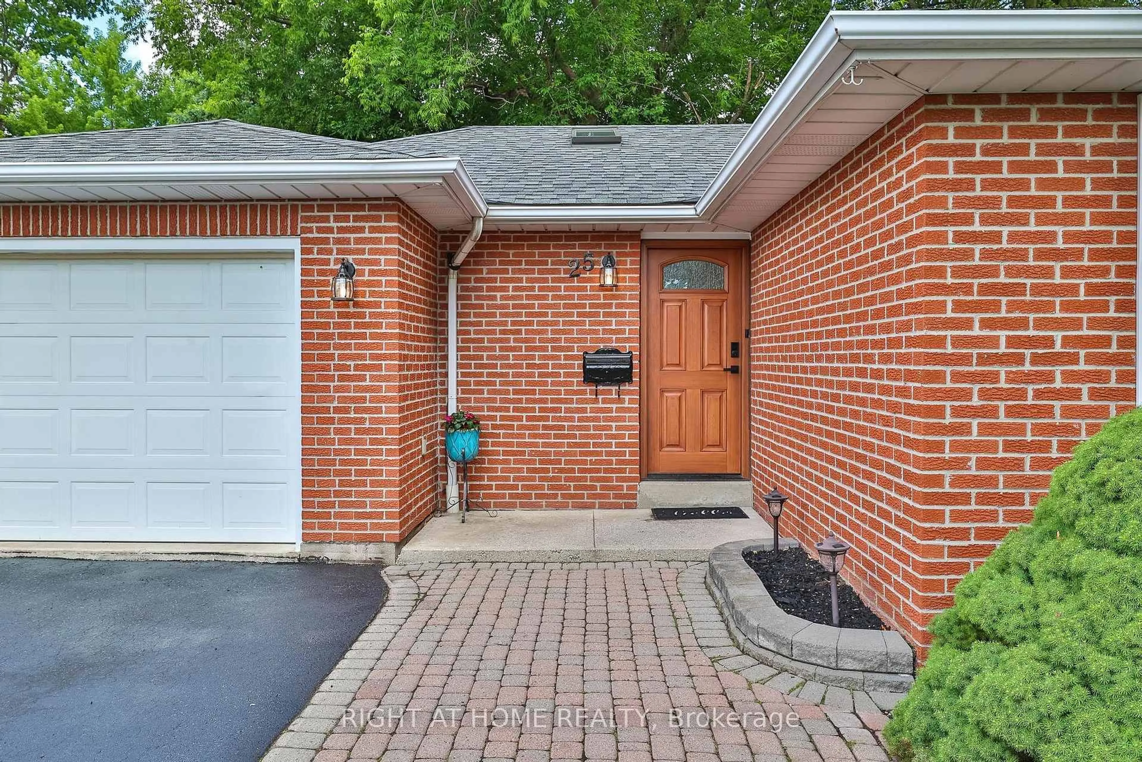 Home with brick exterior material, street for 25 Devonshire Dr, Brampton Ontario L6T 3G5
