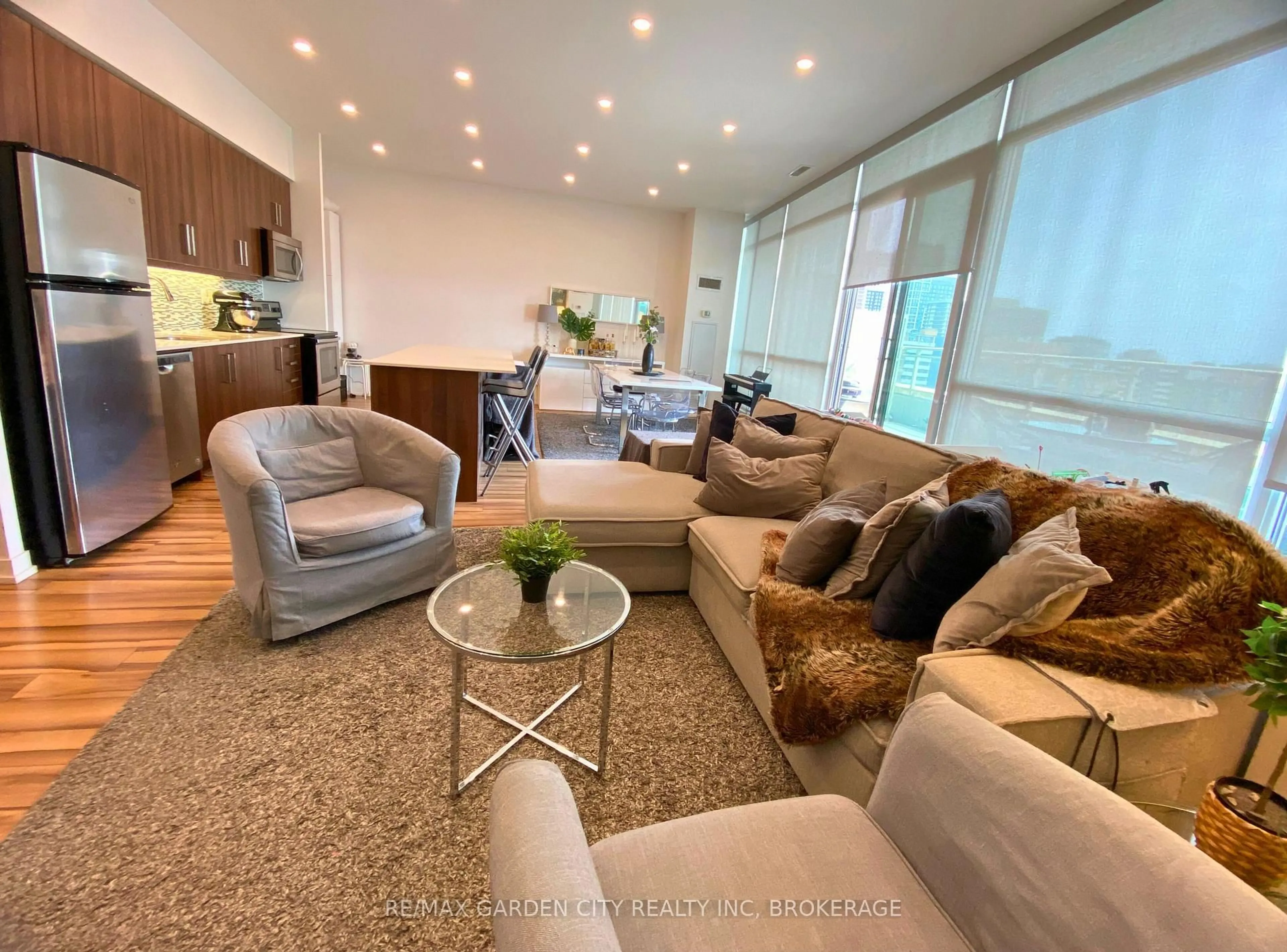 Living room with furniture, unknown for 5101 Dundas St #1402, Toronto Ontario M9A 5G8