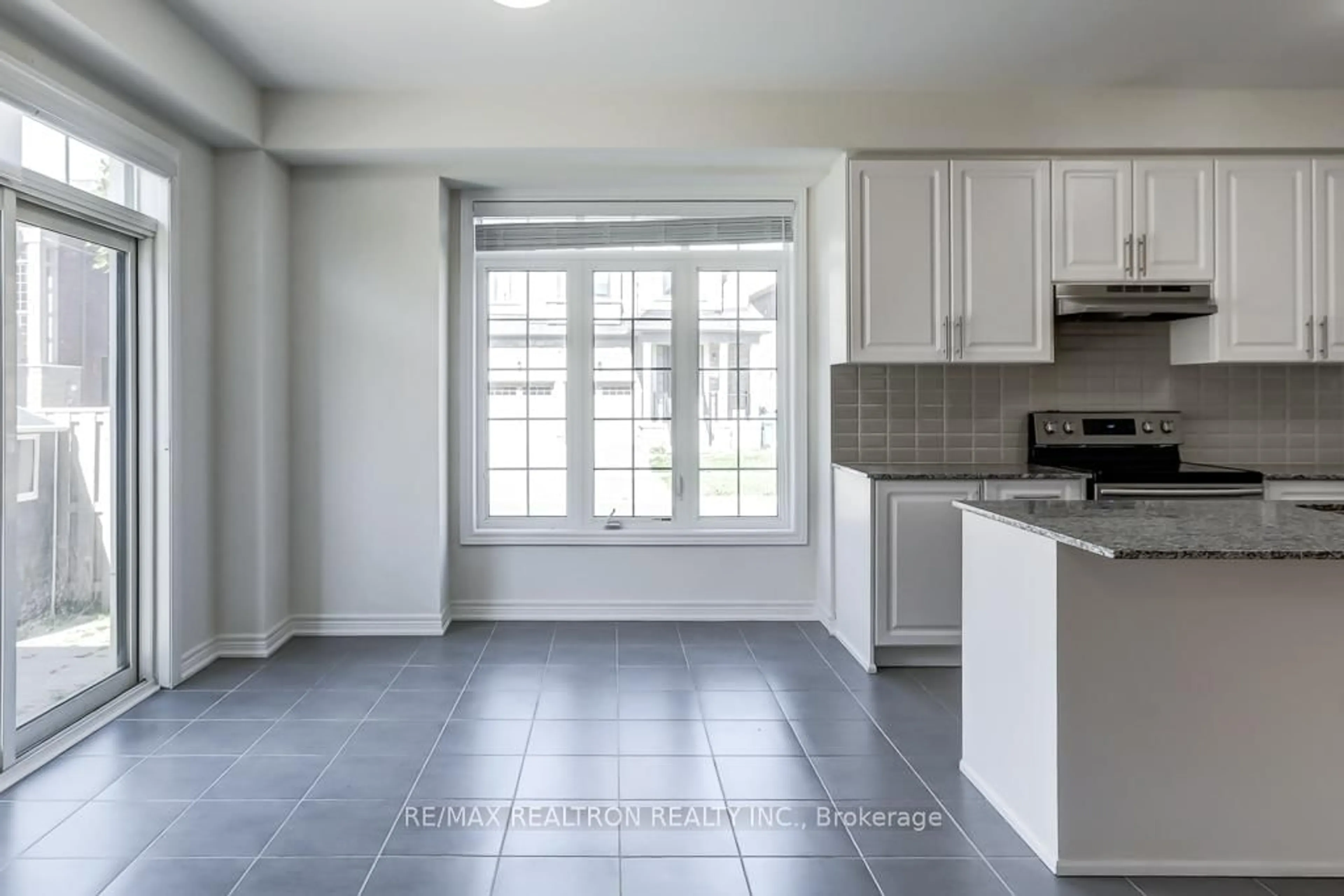 Open concept kitchen, ceramic/tile floor for 44 Brent Stephens Way, Brampton Ontario L7A 0C3