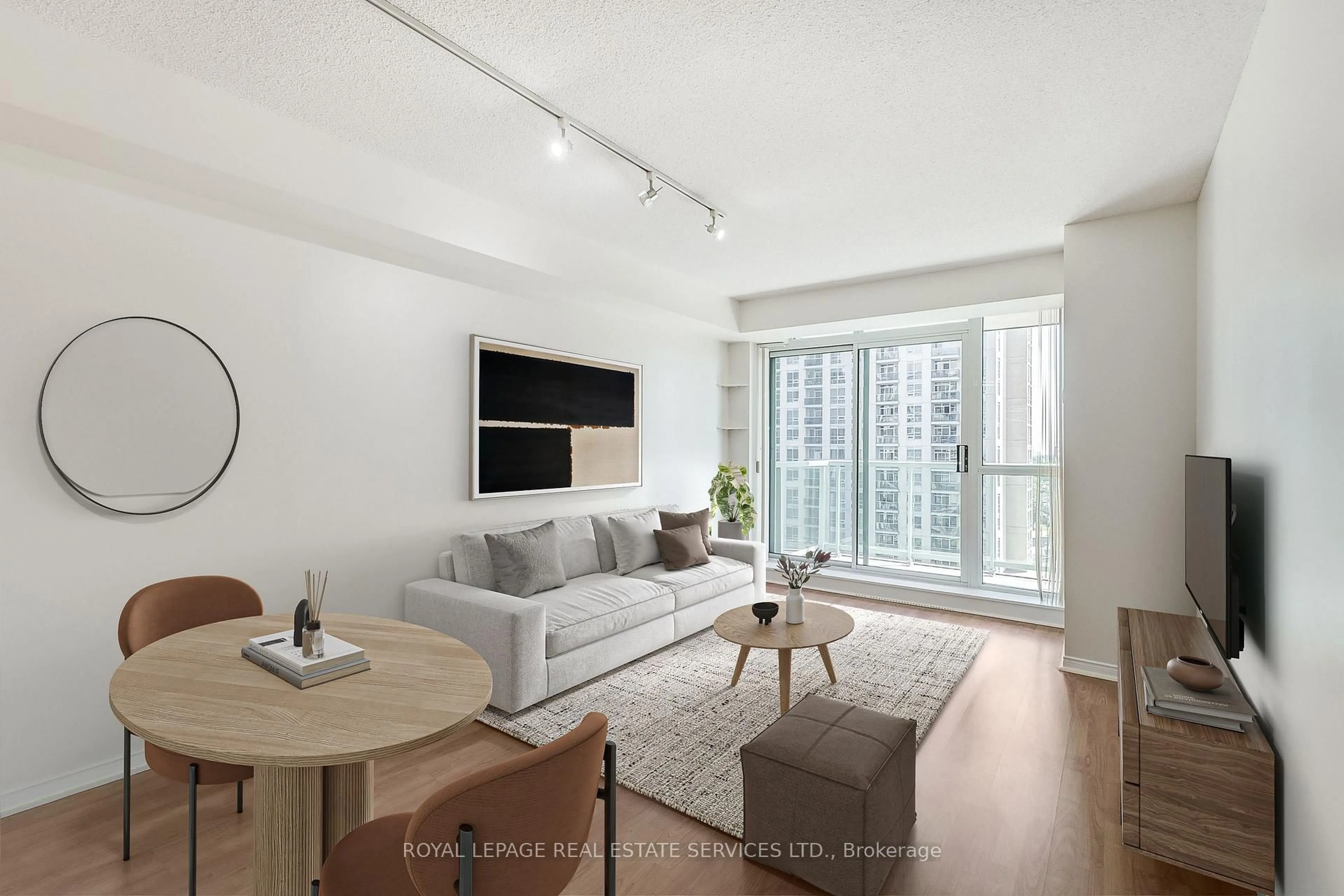Living room with furniture, unknown for 9 Michael Power Pl #1005, Toronto Ontario M9A 0A5