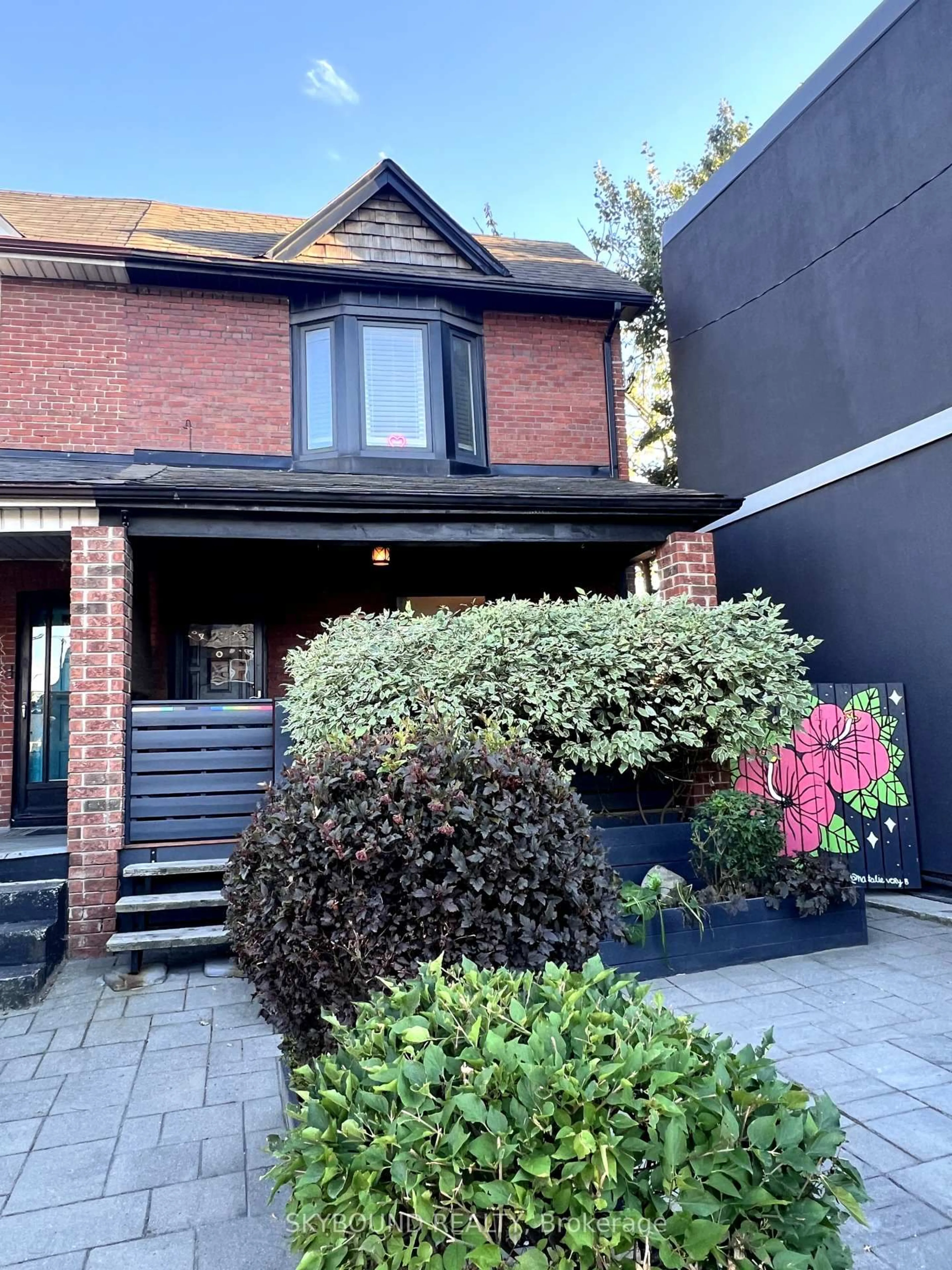 Home with brick exterior material, street for 2043 Davenport Rd, Toronto Ontario M6N 1C5
