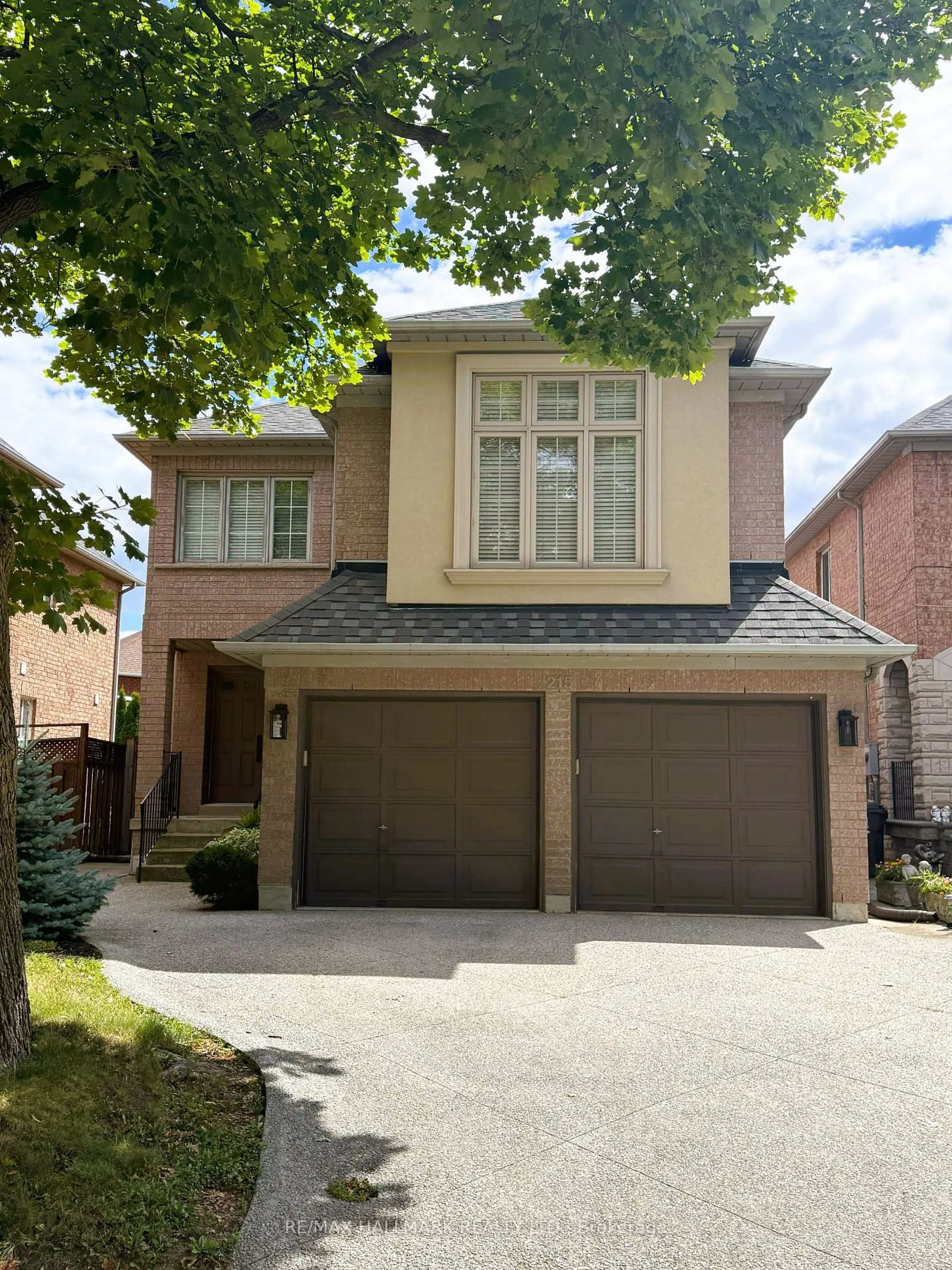 Home with brick exterior material, street for 215 Queenslea Ave, Toronto Ontario M9N 3X5
