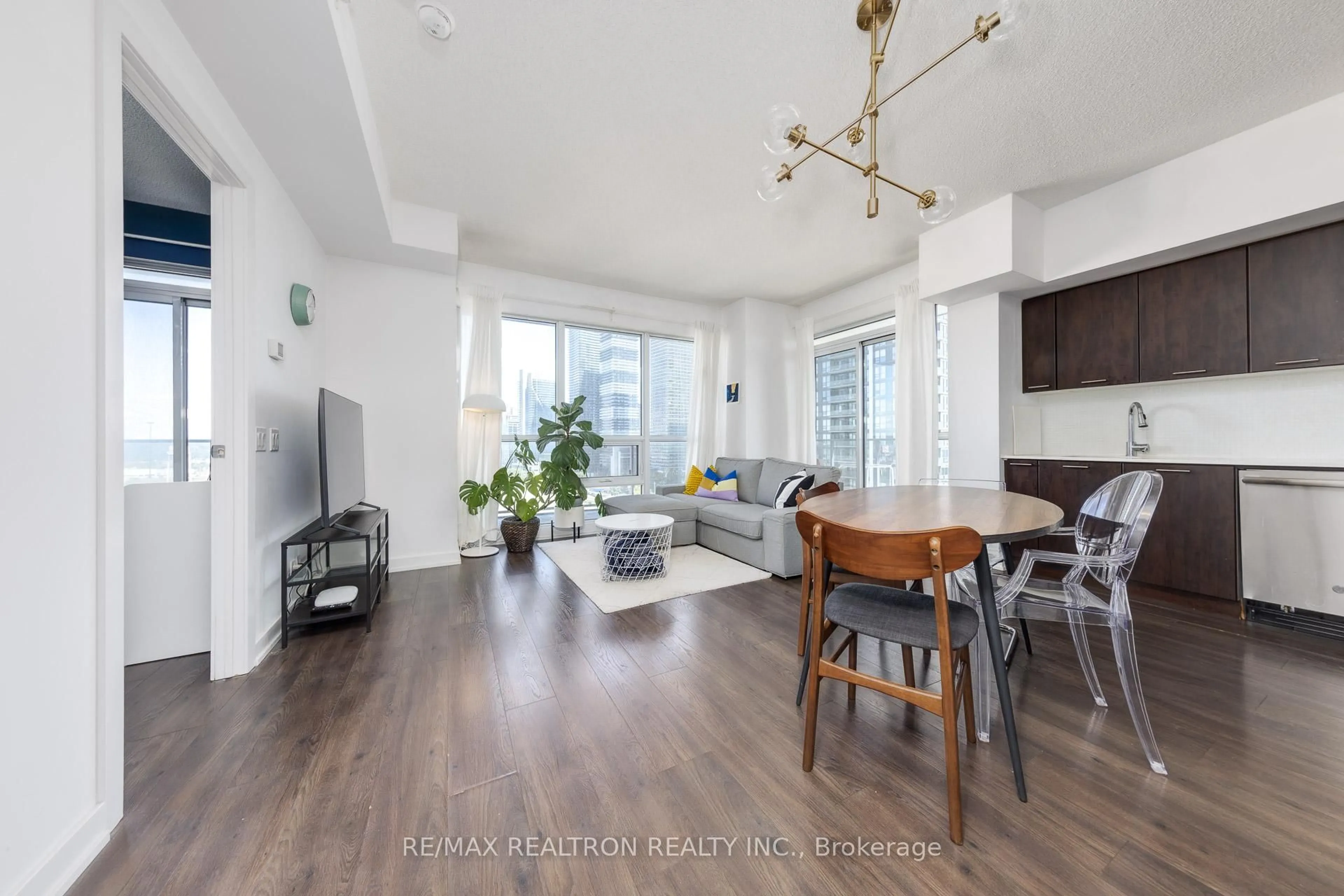 Living room with furniture, wood/laminate floor for 2220 Lakeshore Blvd #1607, Toronto Ontario M8V 0C1