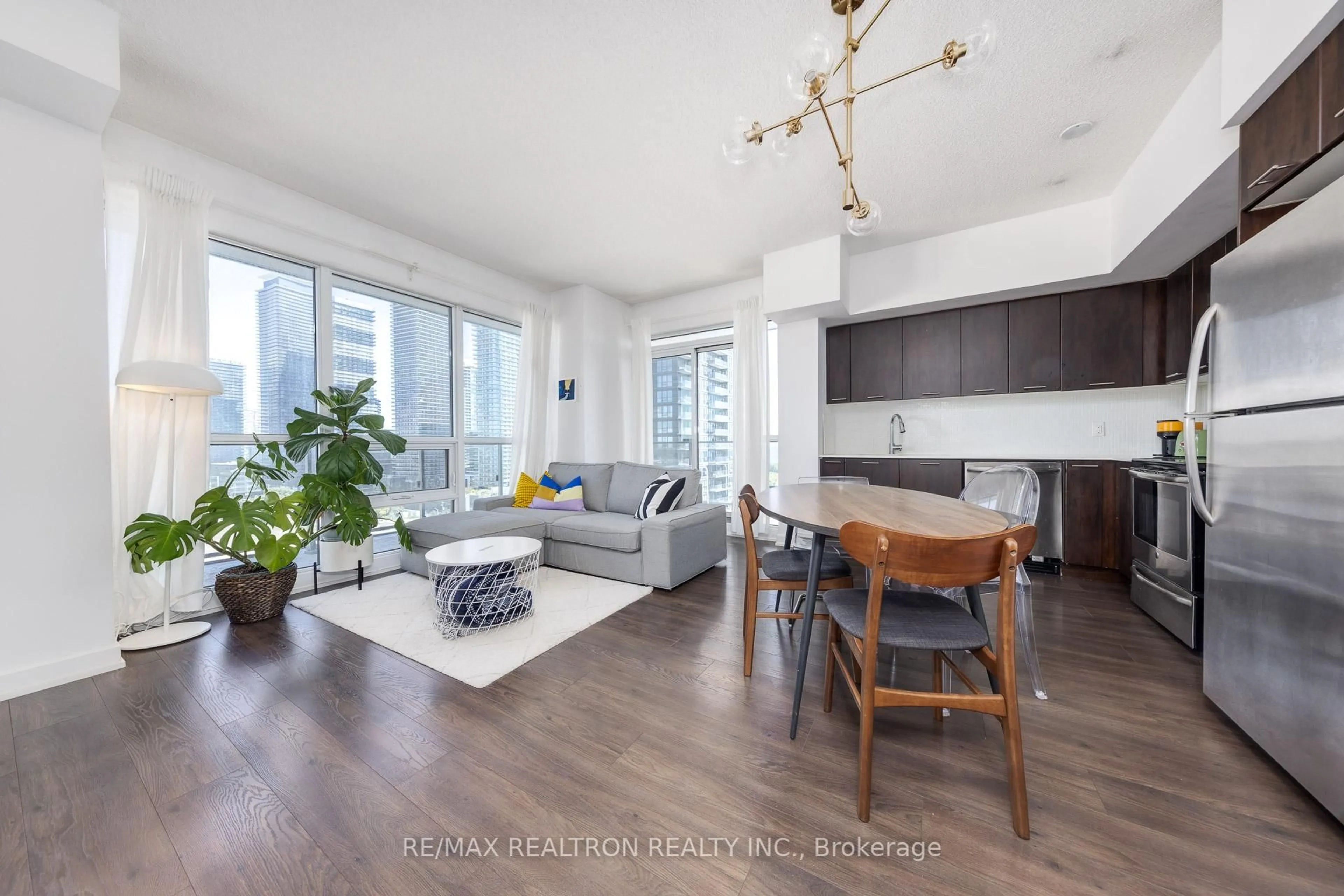 Living room with furniture, wood/laminate floor for 2220 Lakeshore Blvd #1607, Toronto Ontario M8V 0C1