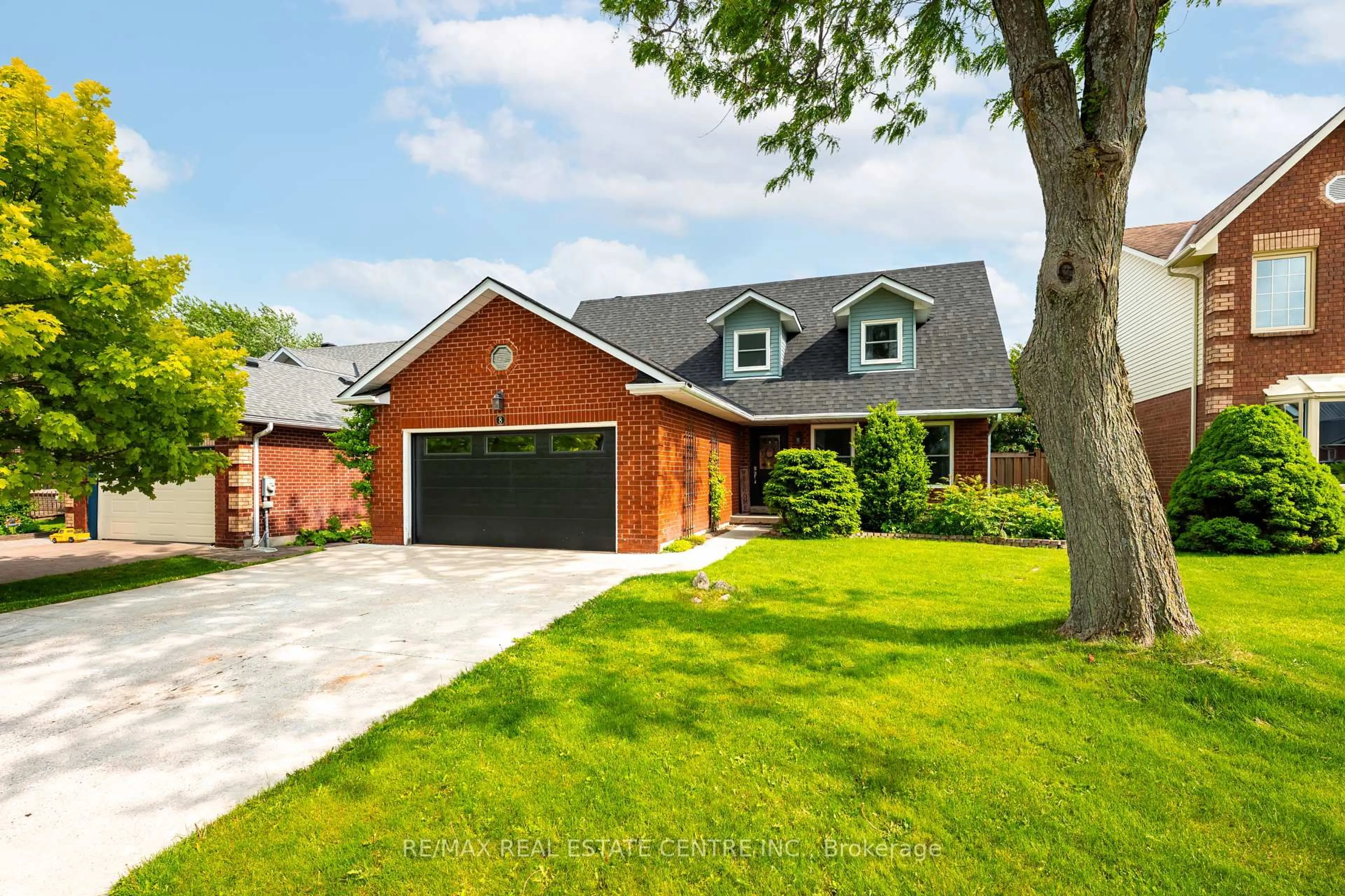 Home with brick exterior material, street for 8 Passmore Ave, Orangeville Ontario L9W 4E2