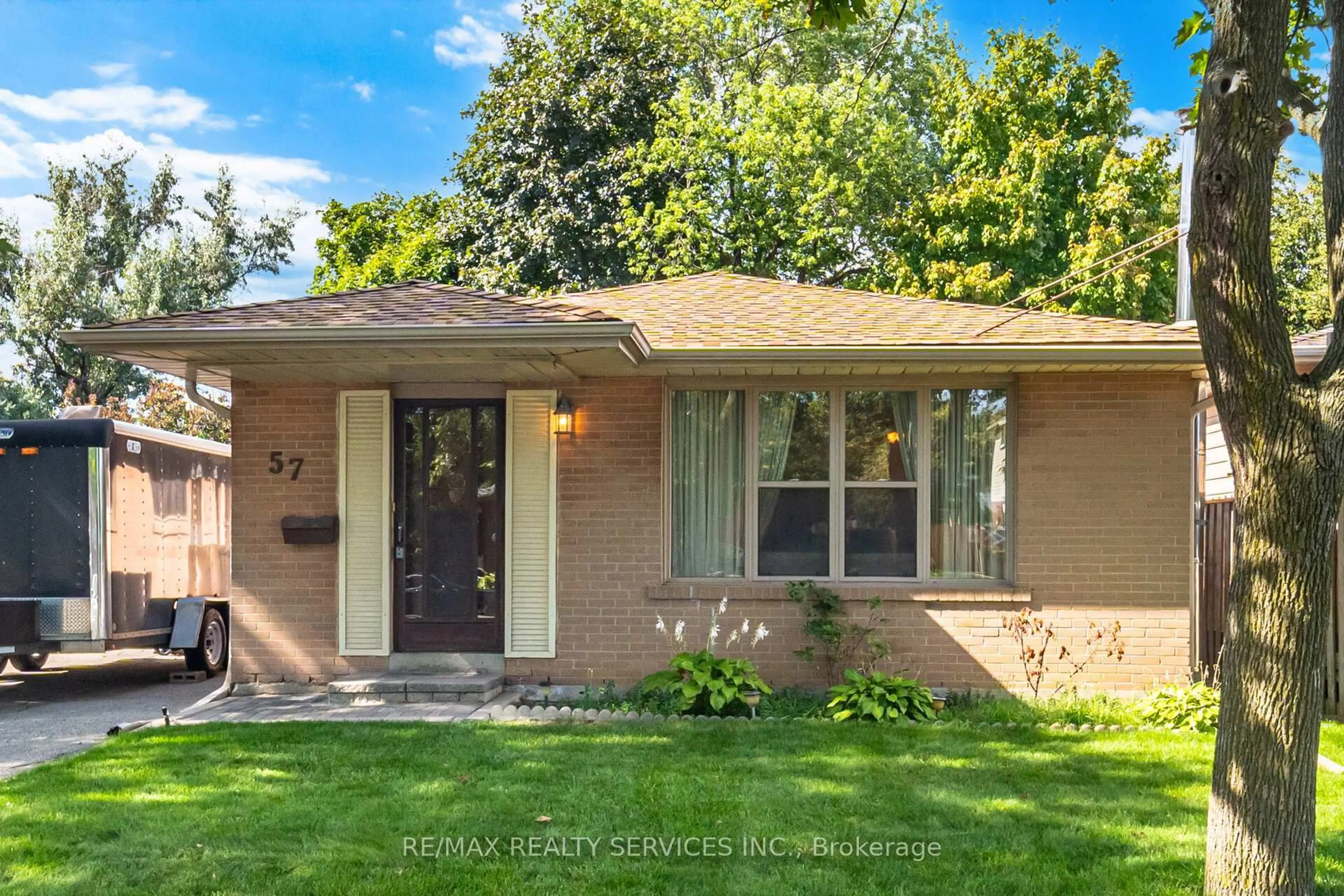 Home with brick exterior material, street for 57 Esplanade Rd, Brampton Ontario L6T 2C6