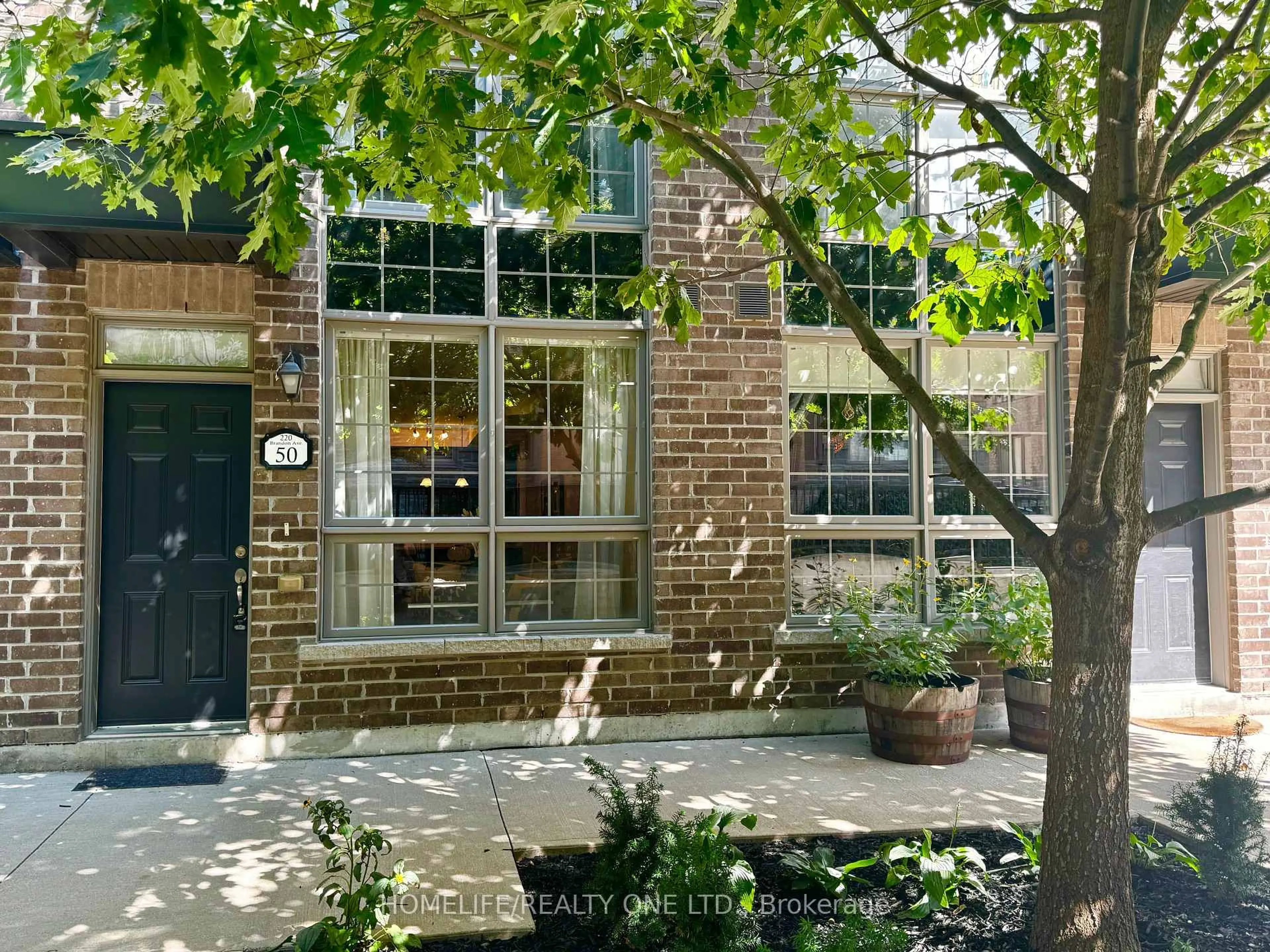 Home with brick exterior material, street for 220 Brandon Ave #TH 50, Toronto Ontario M6H 0C5