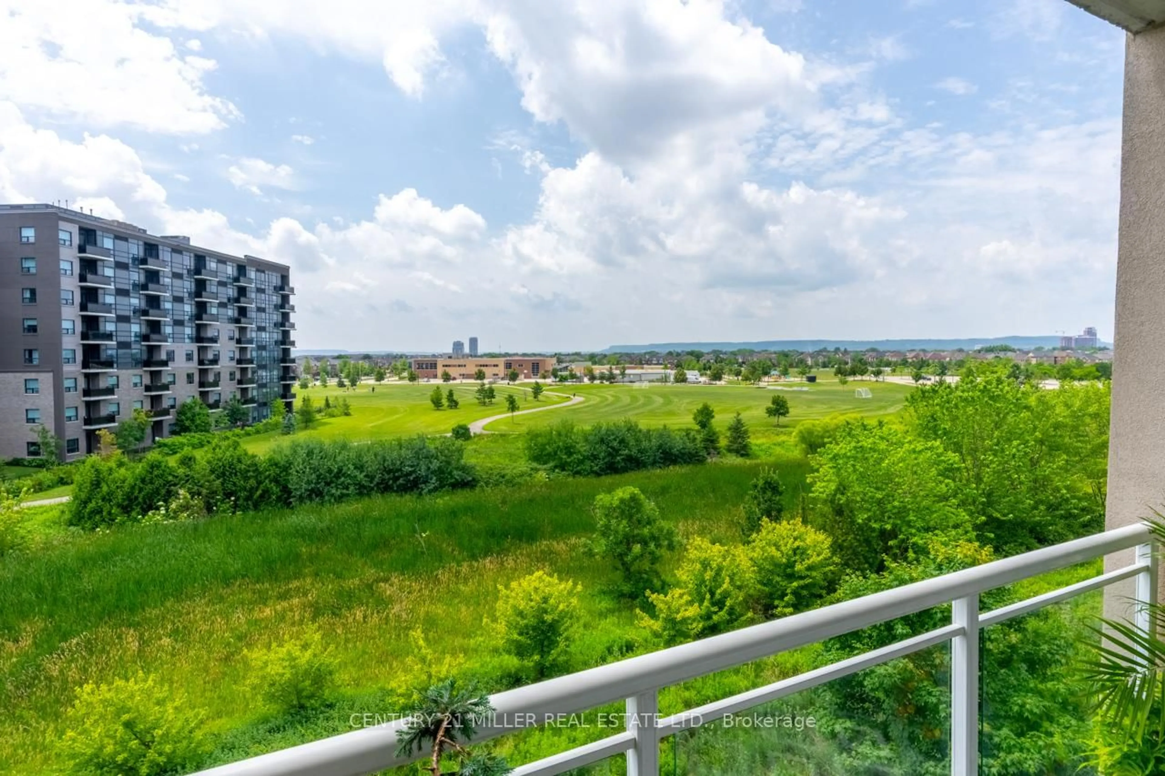 Balcony in the apartment, city buildings view from balcony for 1379 Costigan Rd #408, Milton Ontario L9T 2K6