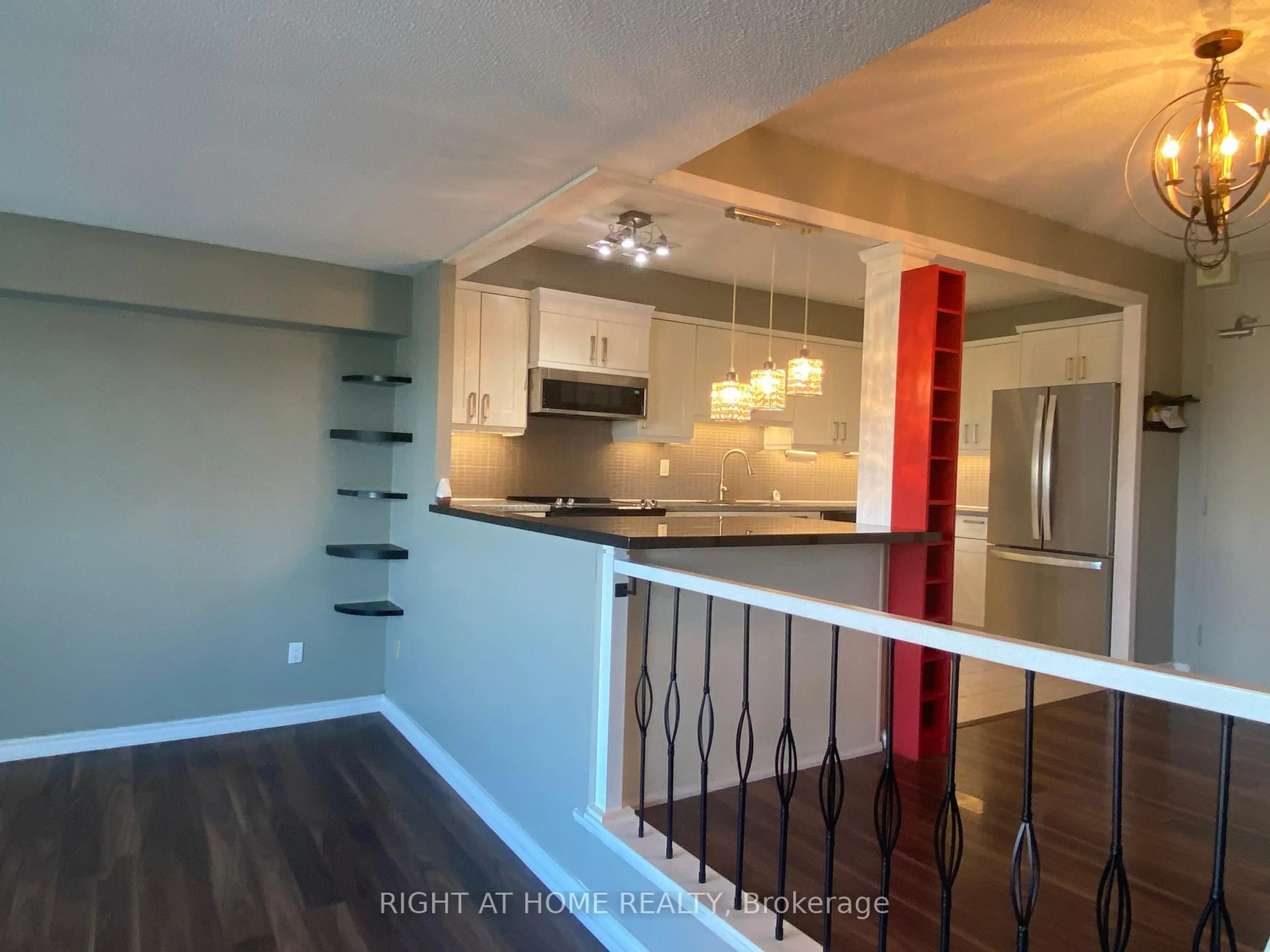 Open concept kitchen, wood/laminate floor for 240 Scarlett Rd #1304, Toronto Ontario M6N 4X4