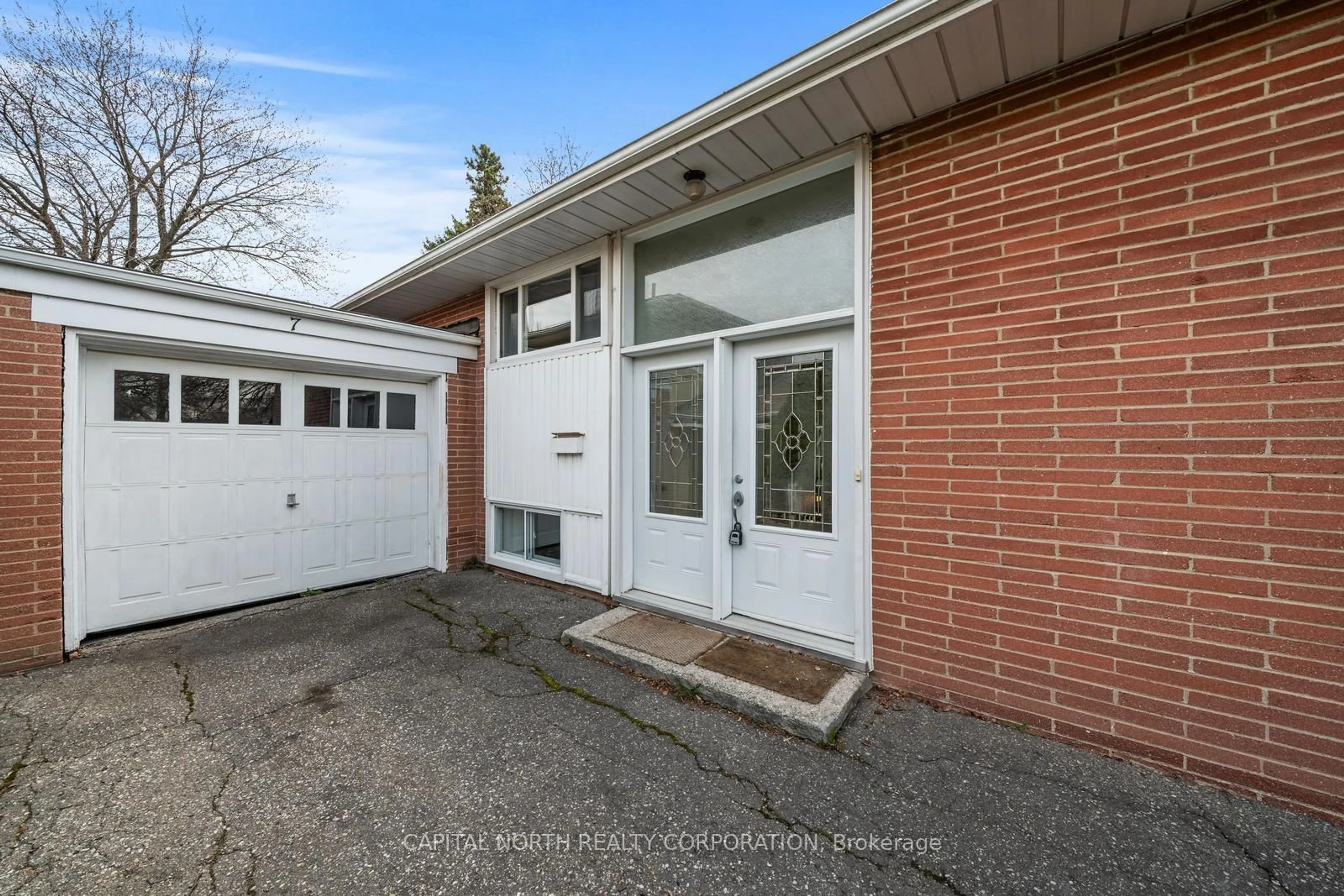 Home with brick exterior material, street for 7 Golfwood Hts, Toronto Ontario M9P 3L8